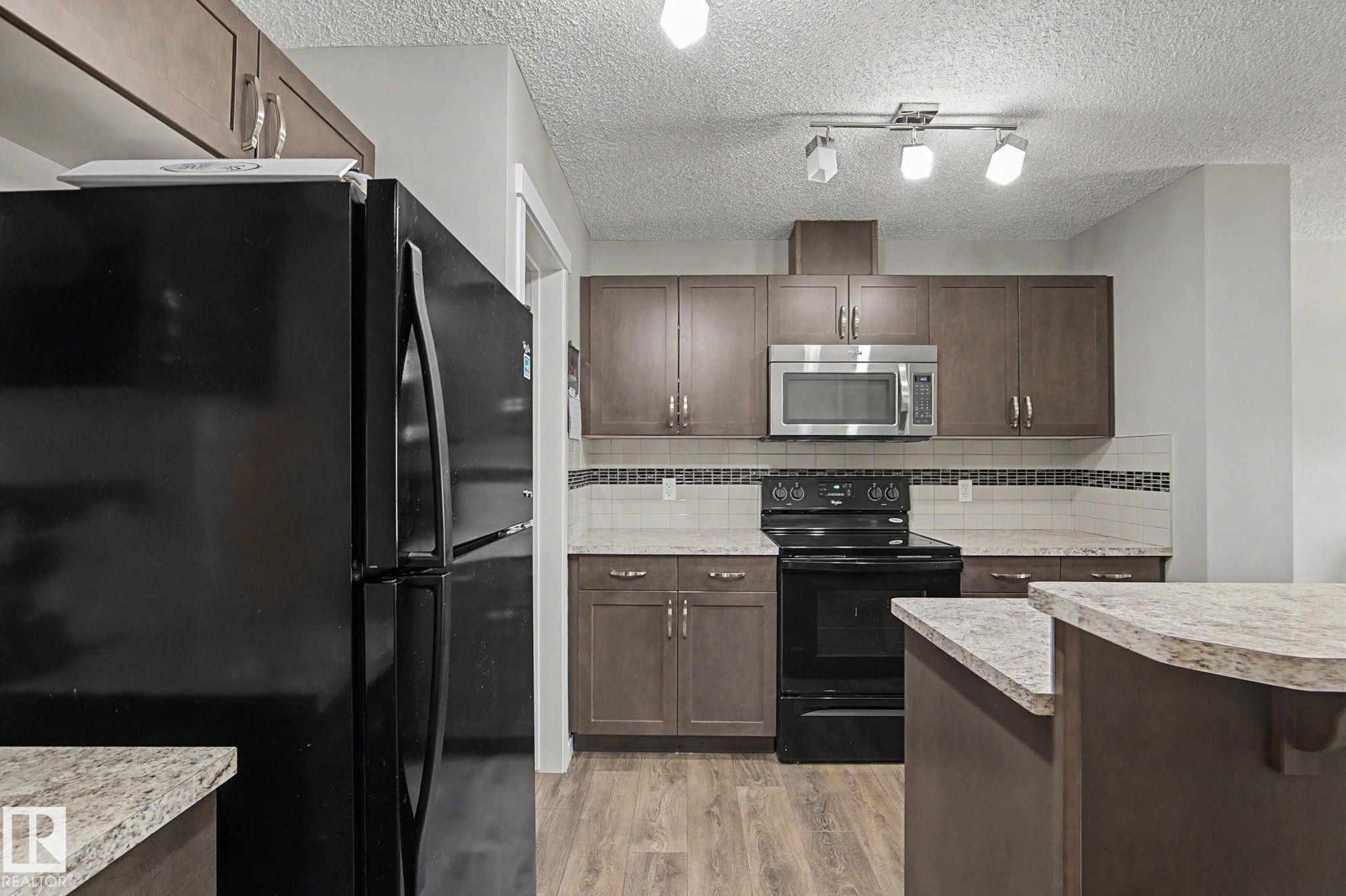 Photo 8 at 1211 29 Street NW, Laurel, Edmonton