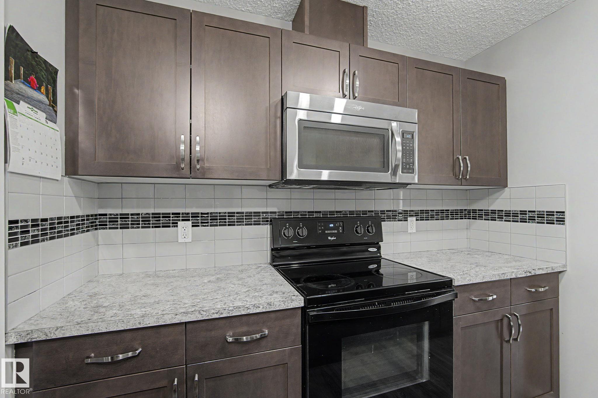 Photo 10 at 1211 29 Street NW, Laurel, Edmonton