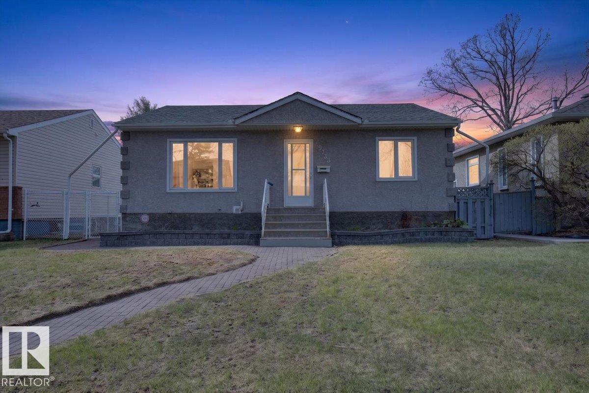 Beautiful 950 sq ft 2 plus 1 bedroom home on a quiet tree lined street with south facing backyard. Open floorplan with large living and dining areas, 2 bedrooms and bath. Fully developed basement with large rec room, bedroom, 3 pc bath and laundry room. A $100,000 interior renovation has just been completed by Dynamic Renovations. Main floor with brand new kitchen & island including stainless appliances, updated 3 pc bath, new vinyl plank flooring, pot lights,  baseboards, casings, interior doors and more. Fully developed basement has brand new carpet, paint, trim and the 3 pc bath has been updated as well. Other upgrades over the years include the roof, soffits, gutters, insulation, and HE furnace, HWT approximately 10 years old. Newer vinyl windows up and down & exterior acrylic stucco & parging. Huge rear deck off the kitchen, and amazing oversized 28' wide by 26.25' deep heated and insulated double garage with 100 amp panel, 8' overhead doors is a winter beater. Some pictures are virtually staged.