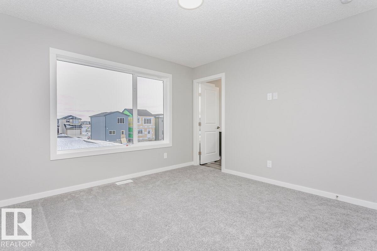 Photo 8 at 314 Hawthorn Way, Woodbend, Leduc