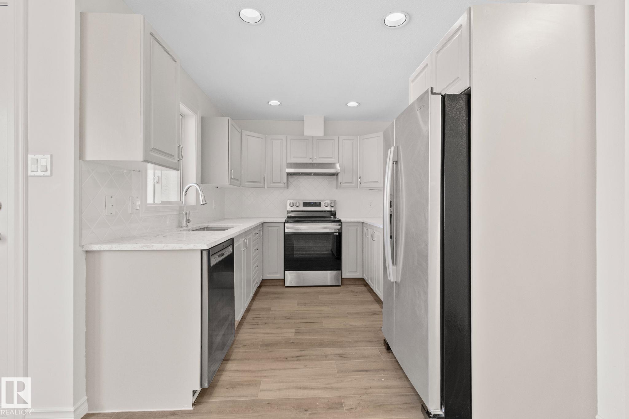 Photo 16 at 22 - 9703 174 Street NW, Terra Losa, Edmonton