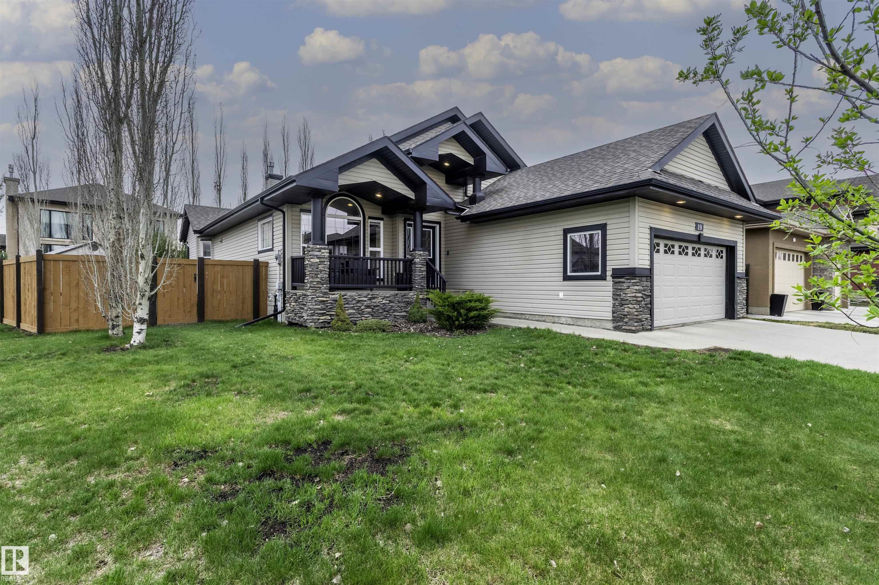 Oh wow! This is the bungalow you've been waiting for! Maybe it's the gorgeous vaulted ceilings, or maybe it's the main floor den with gorgeous front facing windows. Maybe the walk through pantry, heated garage, or huge storage room will get your attention, or the large bright windows, or the oversized staircase that makes the builder-finished basement so welcoming. The gorgeous ensuite? The attention to finishing that only a former show home brings? Or the parklike backyard? Whatever it is, there's something about this home that just grabs you and says "this is home". What a home it is! You'll feel at peace here, you'll enjoy great family times in the entertainers paradise of a basement, be it billiards games or movie nights or just enjoying a warm fire on a cold night. This is home, and it will serve you well.