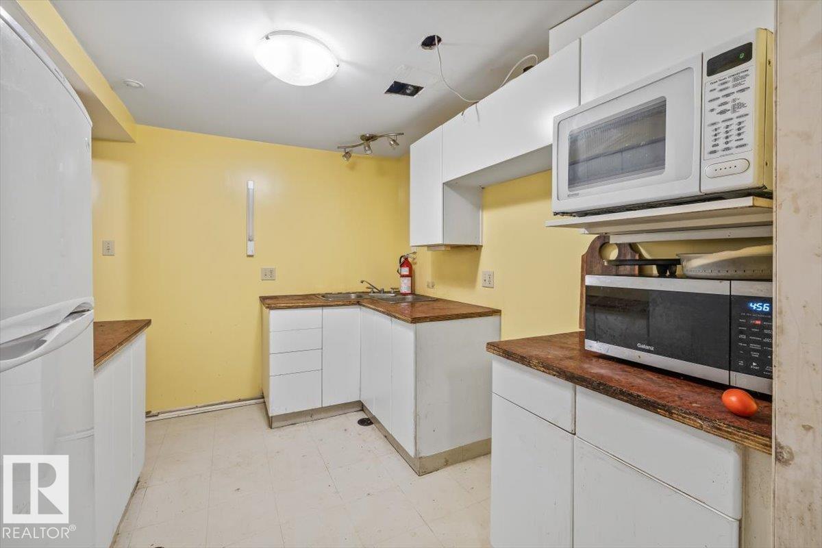 Photo 21 at 9732 64 Street NW, Ottewell, Edmonton