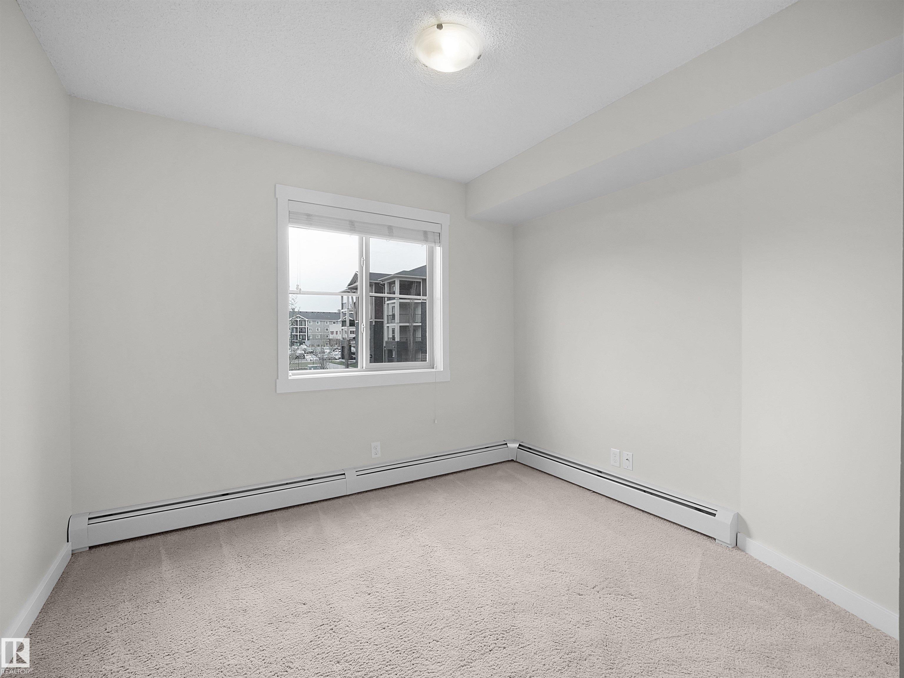 Photo 12 at 220 - 5804 Mullen Place NW, MacTaggart, Edmonton