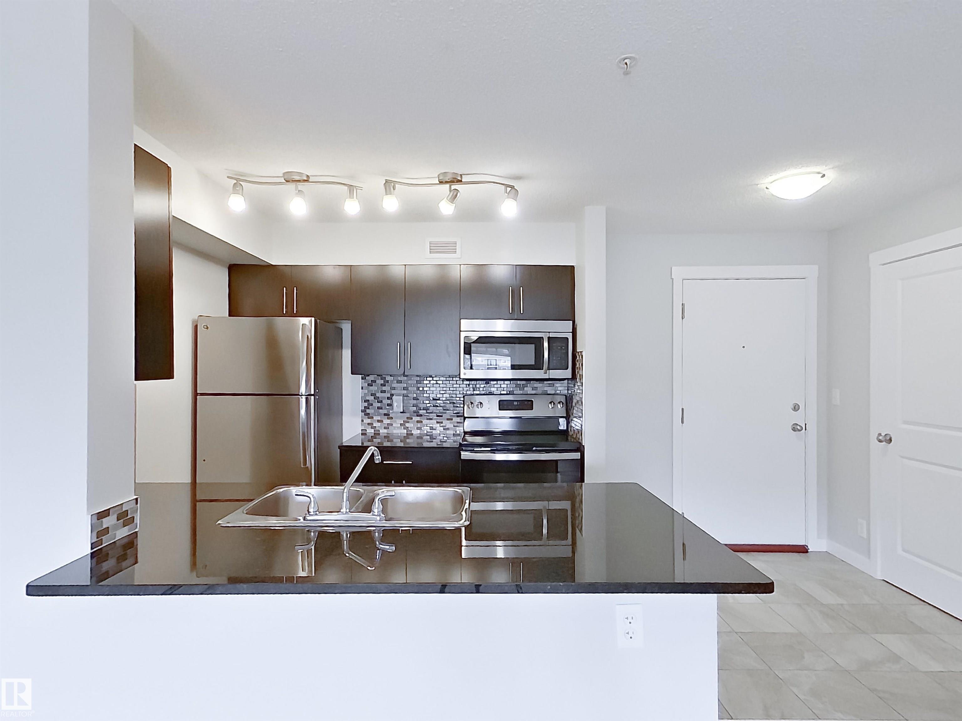 Photo 6 at 220 - 5804 Mullen Place NW, MacTaggart, Edmonton