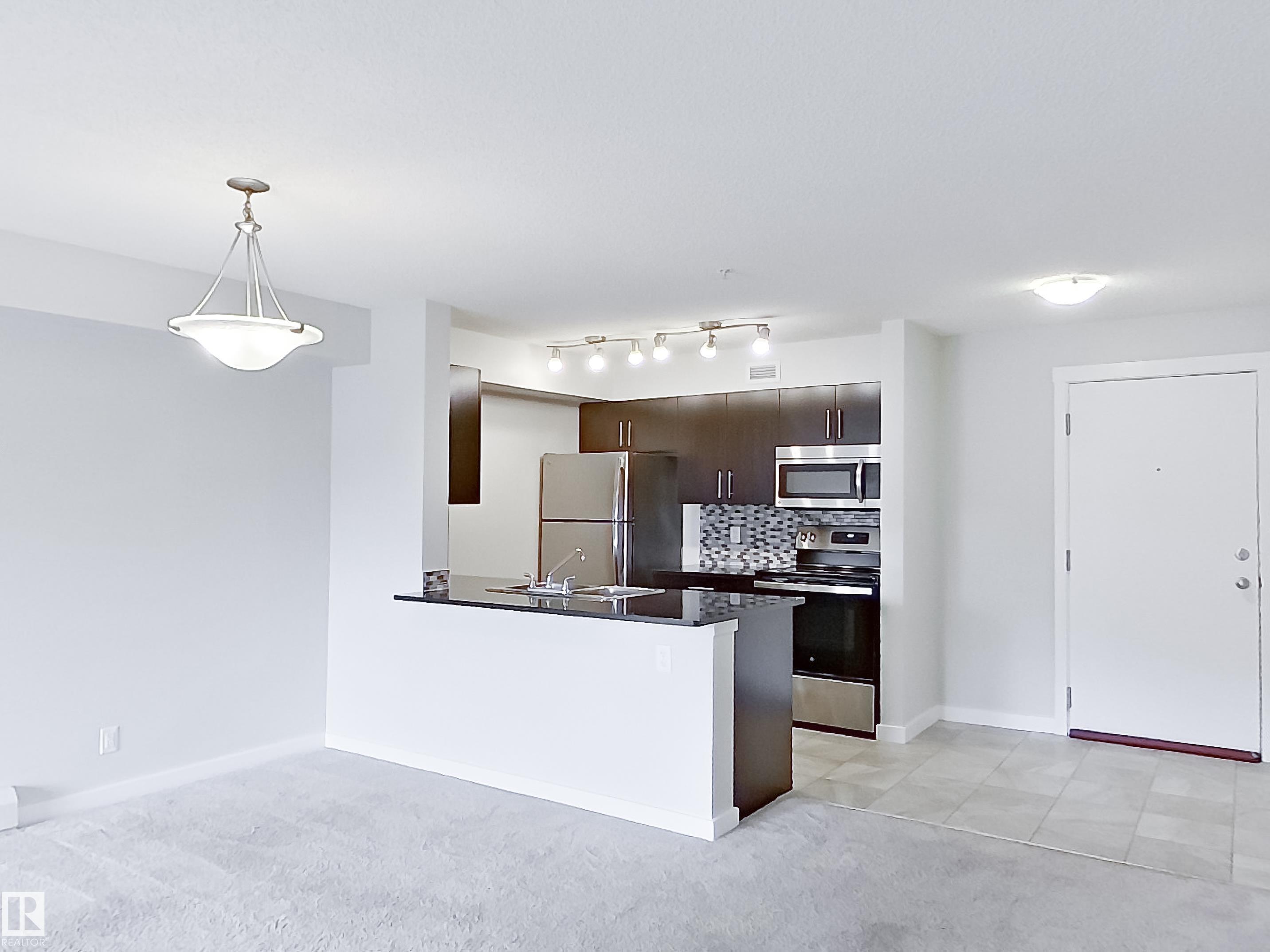 Photo 7 at 220 - 5804 Mullen Place NW, MacTaggart, Edmonton