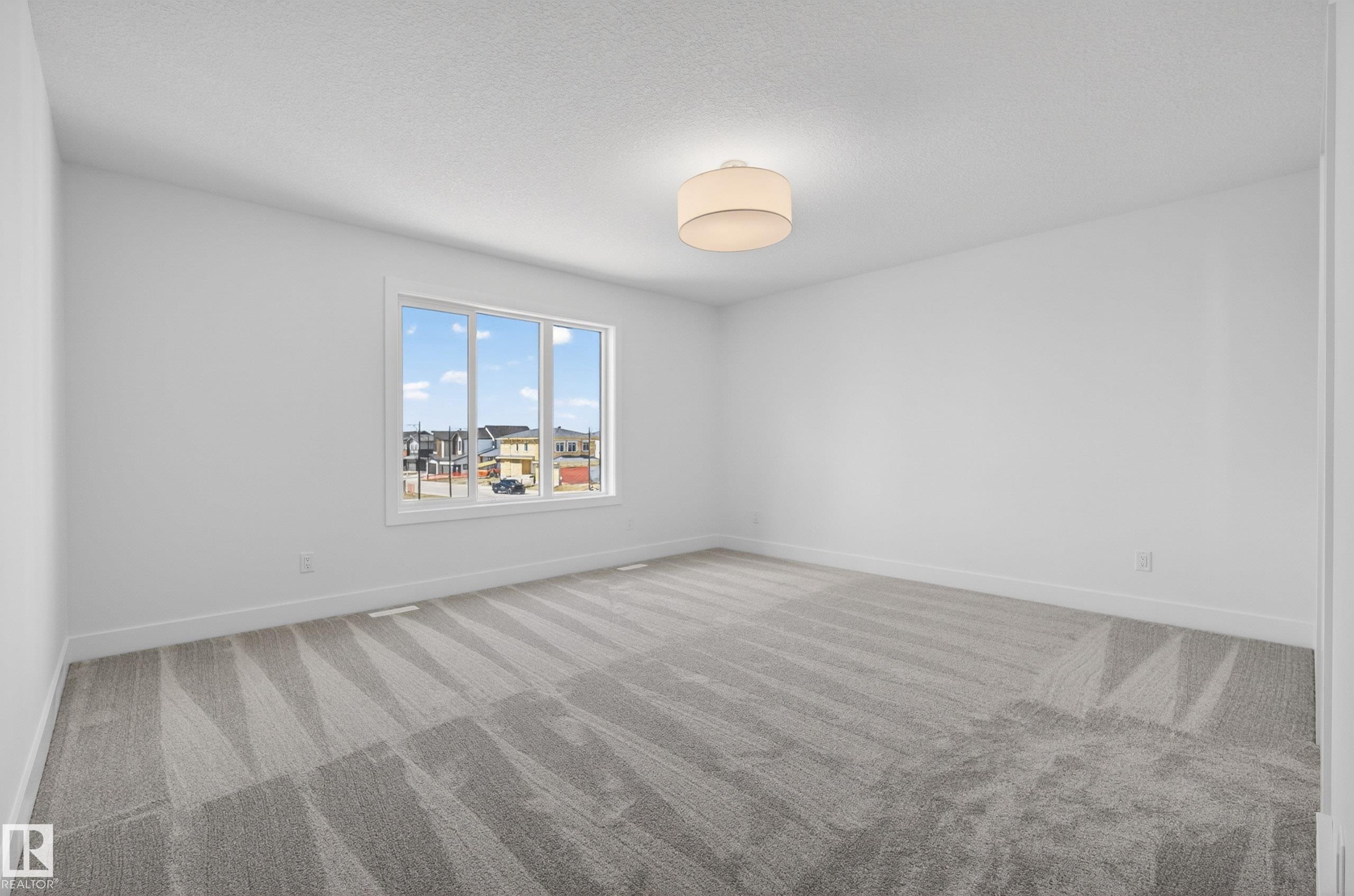 Photo 32 at 7089 Kiviaq Crescent SW, Keswick, Edmonton