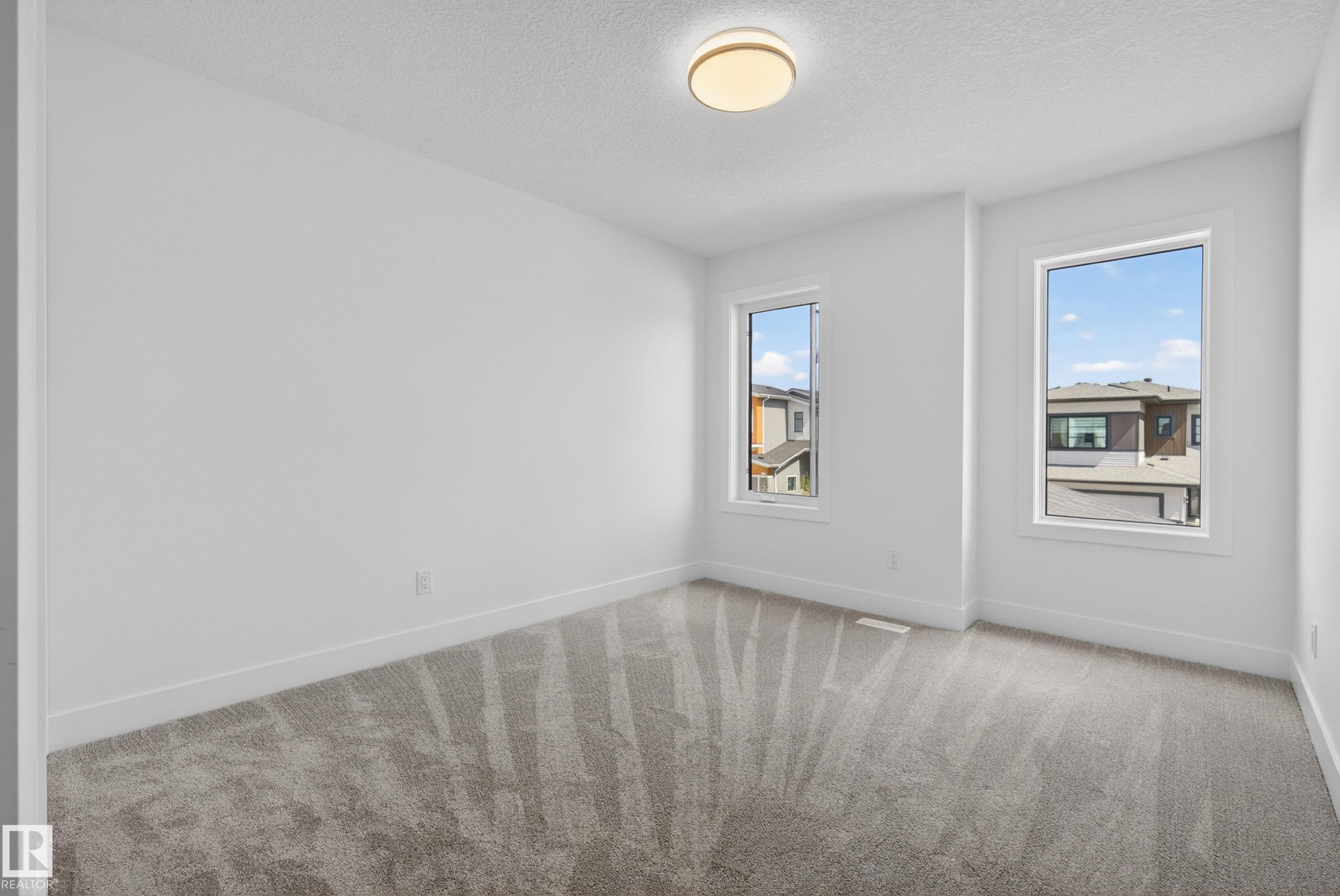Photo 39 at 7089 Kiviaq Crescent SW, Keswick, Edmonton
