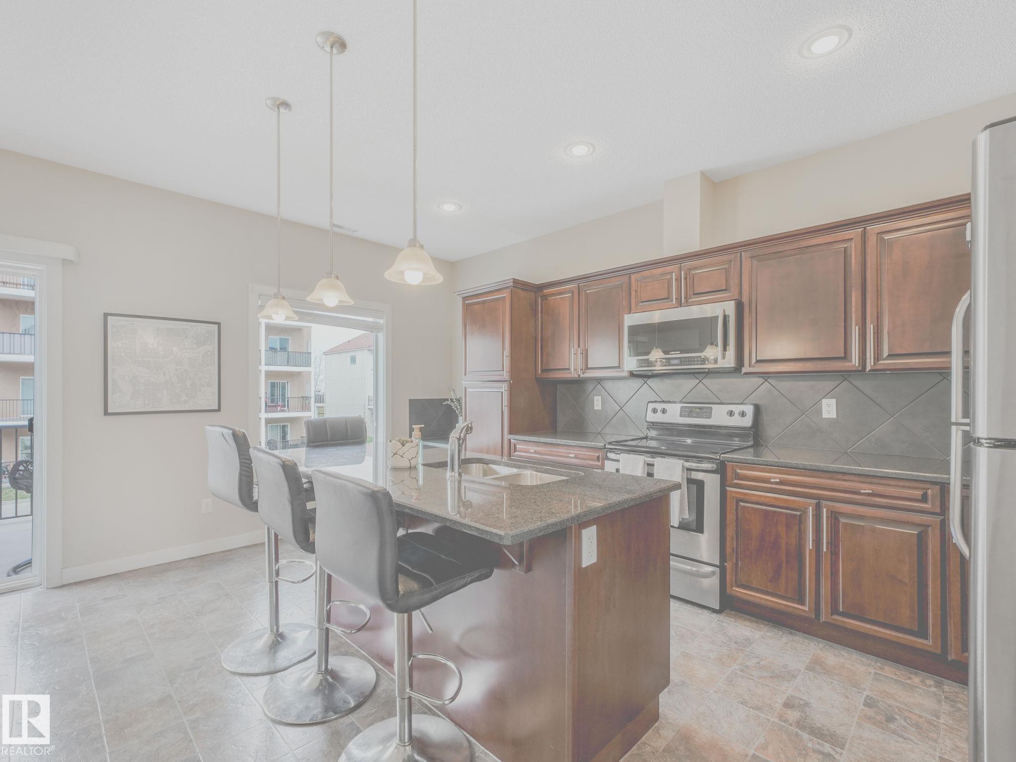Photo 9 at 37 - 13825 155 Avenue NW, Carlton, Edmonton