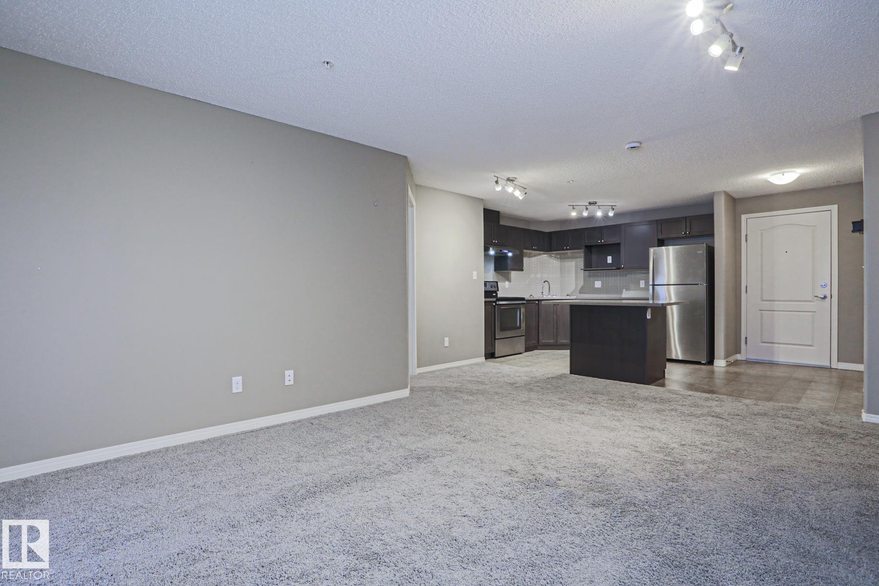 Photo 12 at 201 - 1520 Hammond Gate NW, The Hamptons, Edmonton