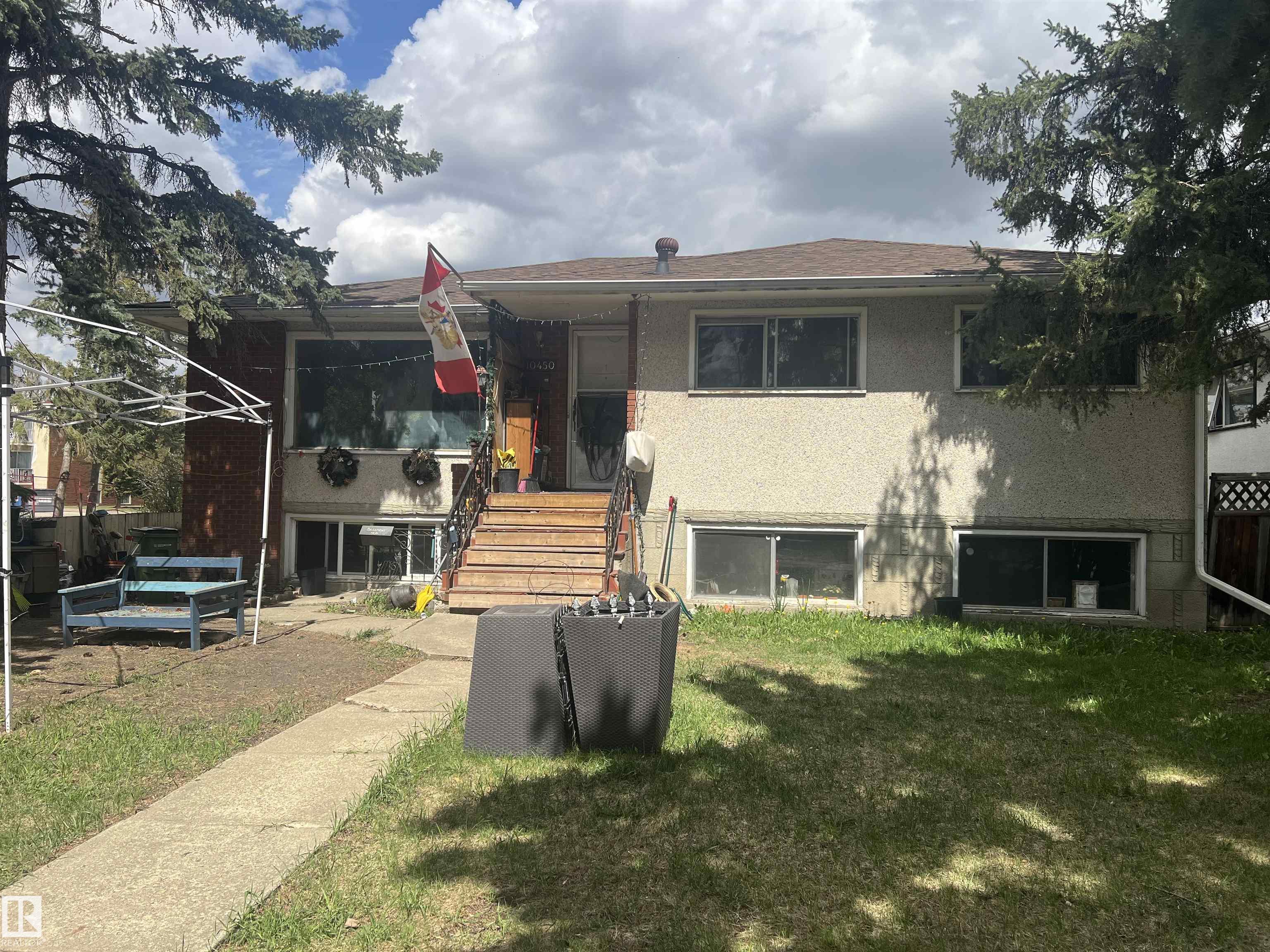 Situated on a 6583.6 square foot lot and a half, this 3 bed/2 bath (1 ensuite) raised bungalow in desirable Allendale has a basement with second kitchen and two bedrooms and an entrance from the exterior as well a double garage. Close to shopping, pools, parks, this charming community is a quick commute to University, Downtown and Whyte Ave. The lot is perfect for developers and investors with potential for up to eight unit builds. For the ambitious, the house is great for a flip. The home does need a refresh but with separate furnaces for each level, the basement having tons of windows making a bright, inviting space and a big beautiful yard on a tree lined street, all it needs is someone with a vision and imagination.