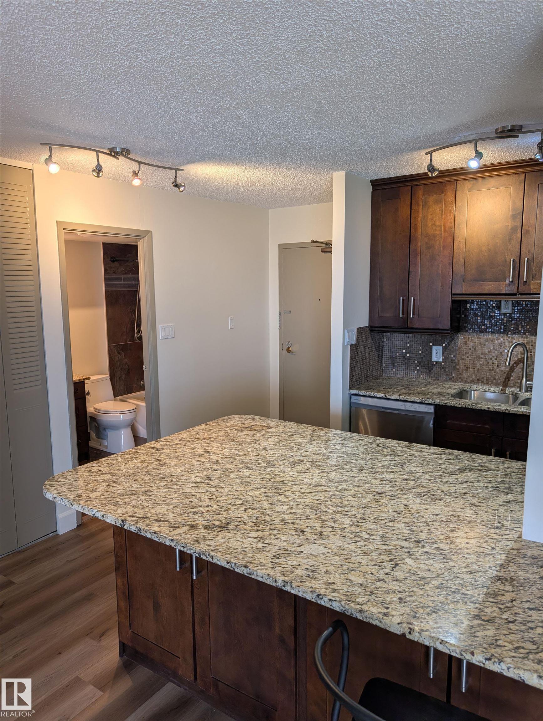 Photo 11 at 705 - 12141 Jasper Avenue NW, Wîhkwêntôwin, Edmonton