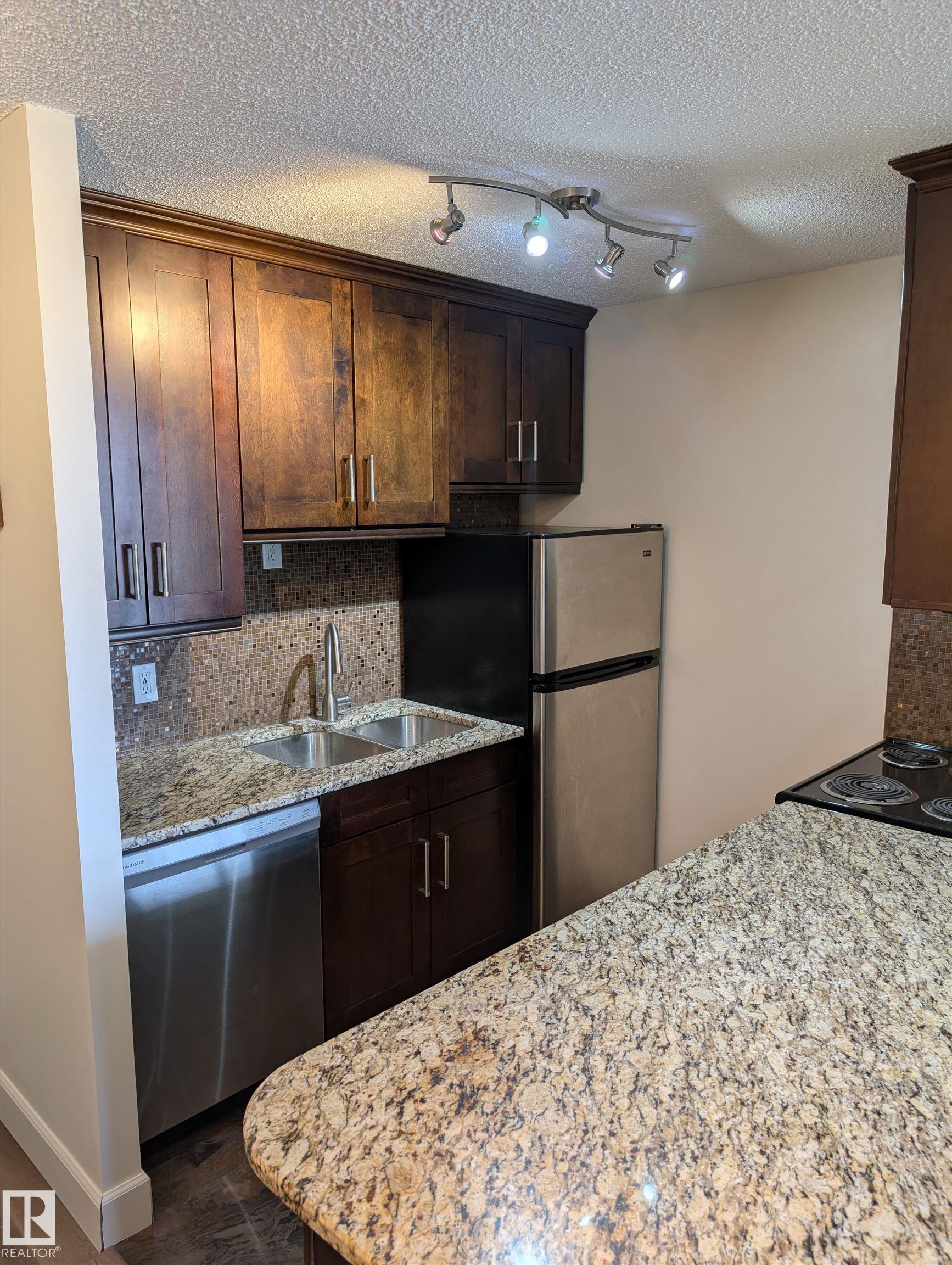 Photo 7 at 705 - 12141 Jasper Avenue NW, Wîhkwêntôwin, Edmonton