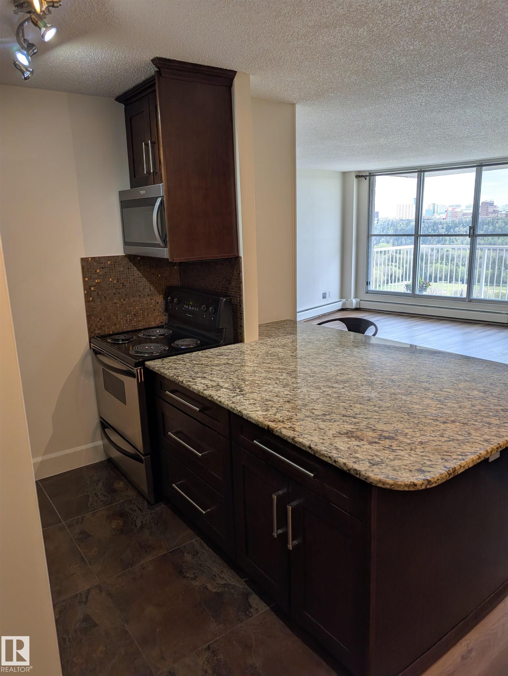 Photo 8 at 705 - 12141 Jasper Avenue NW, Wîhkwêntôwin, Edmonton