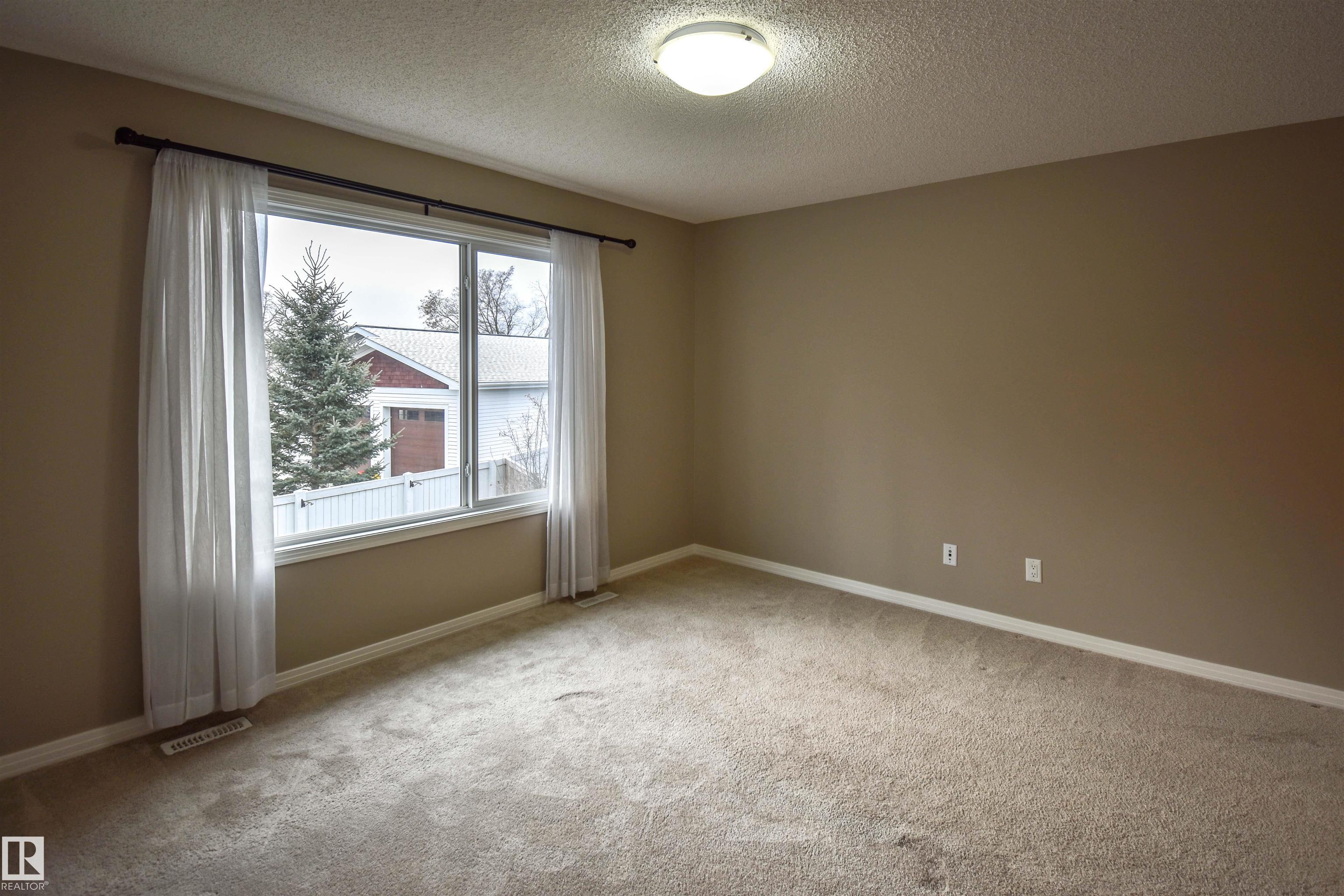 Photo 13 at 19 Meadowgrove Lane, McLaughlin, Spruce Grove