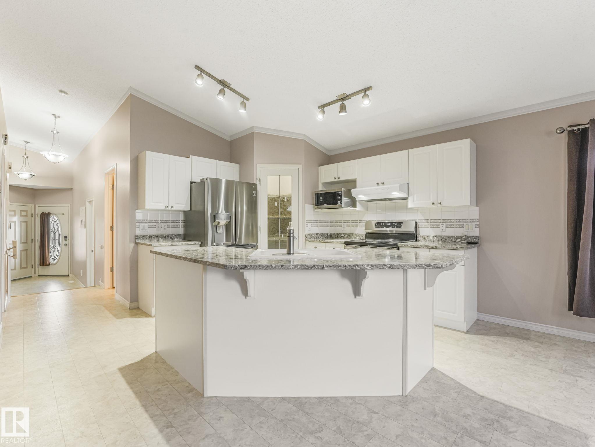 Photo 7 at 3620 130 Avenue NW, Belmont, Edmonton