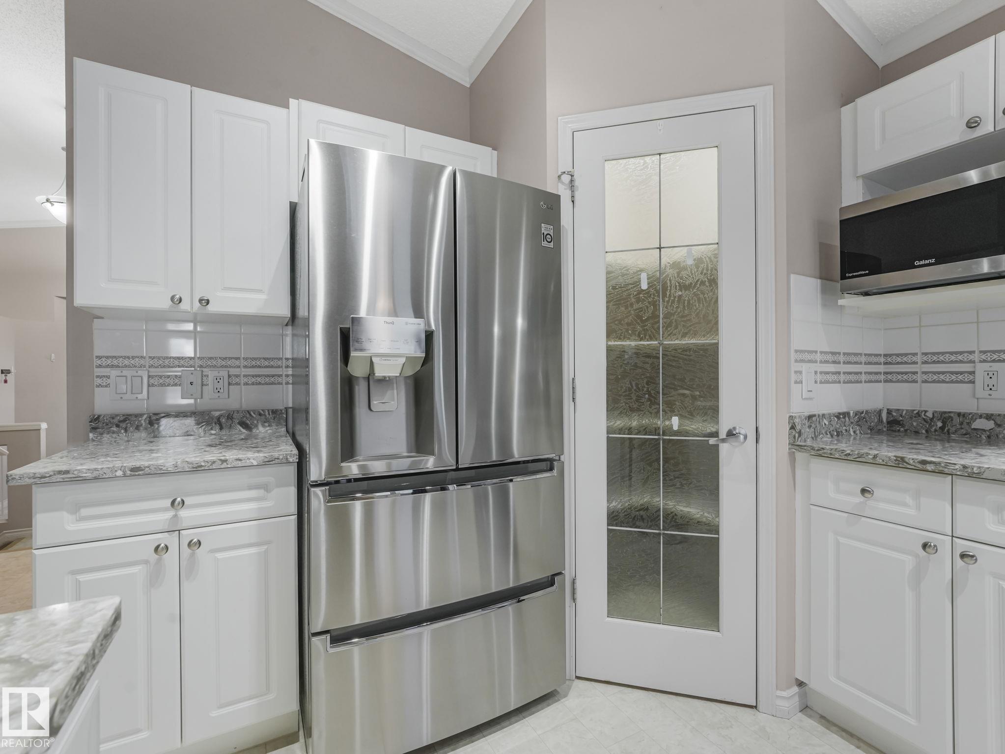 Photo 9 at 3620 130 Avenue NW, Belmont, Edmonton