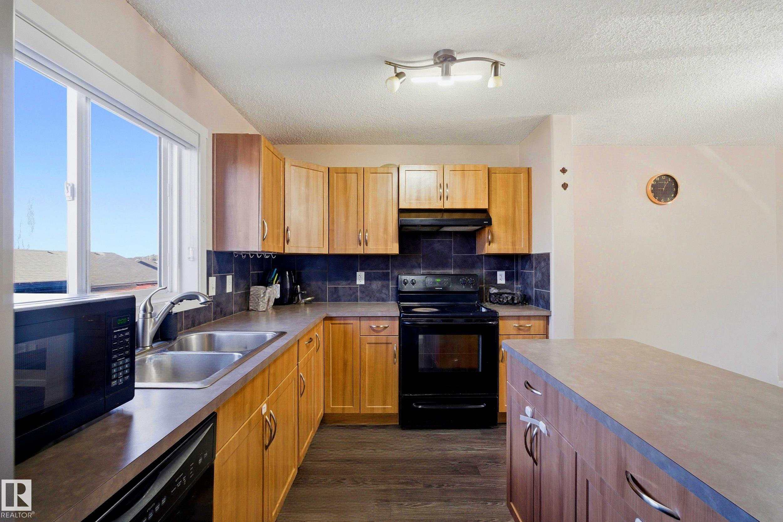 Photo 8 at 2132 32 Street NW, Laurel, Edmonton