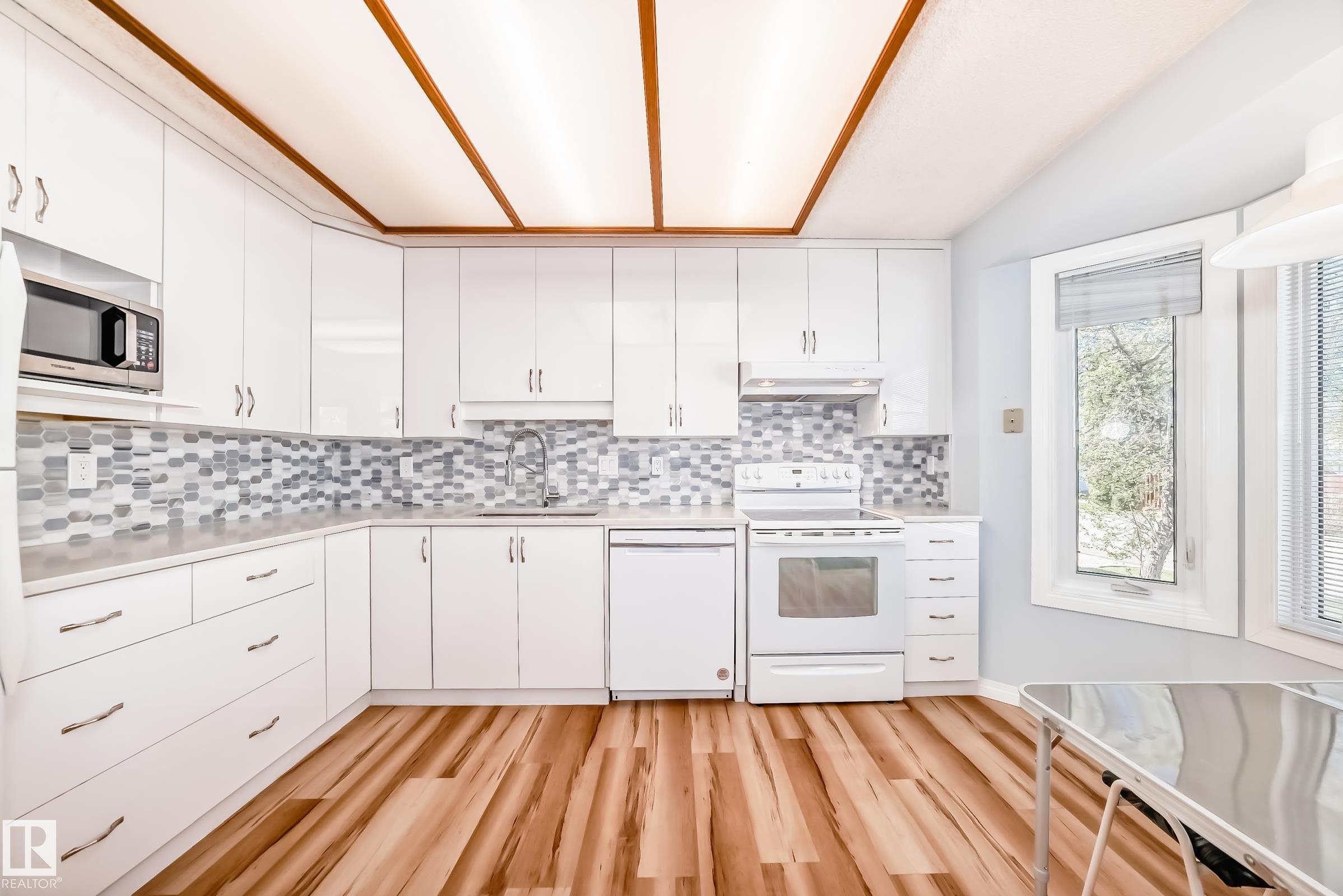 Photo 7 at 5927 189 Street NW, Jamieson Place, Edmonton