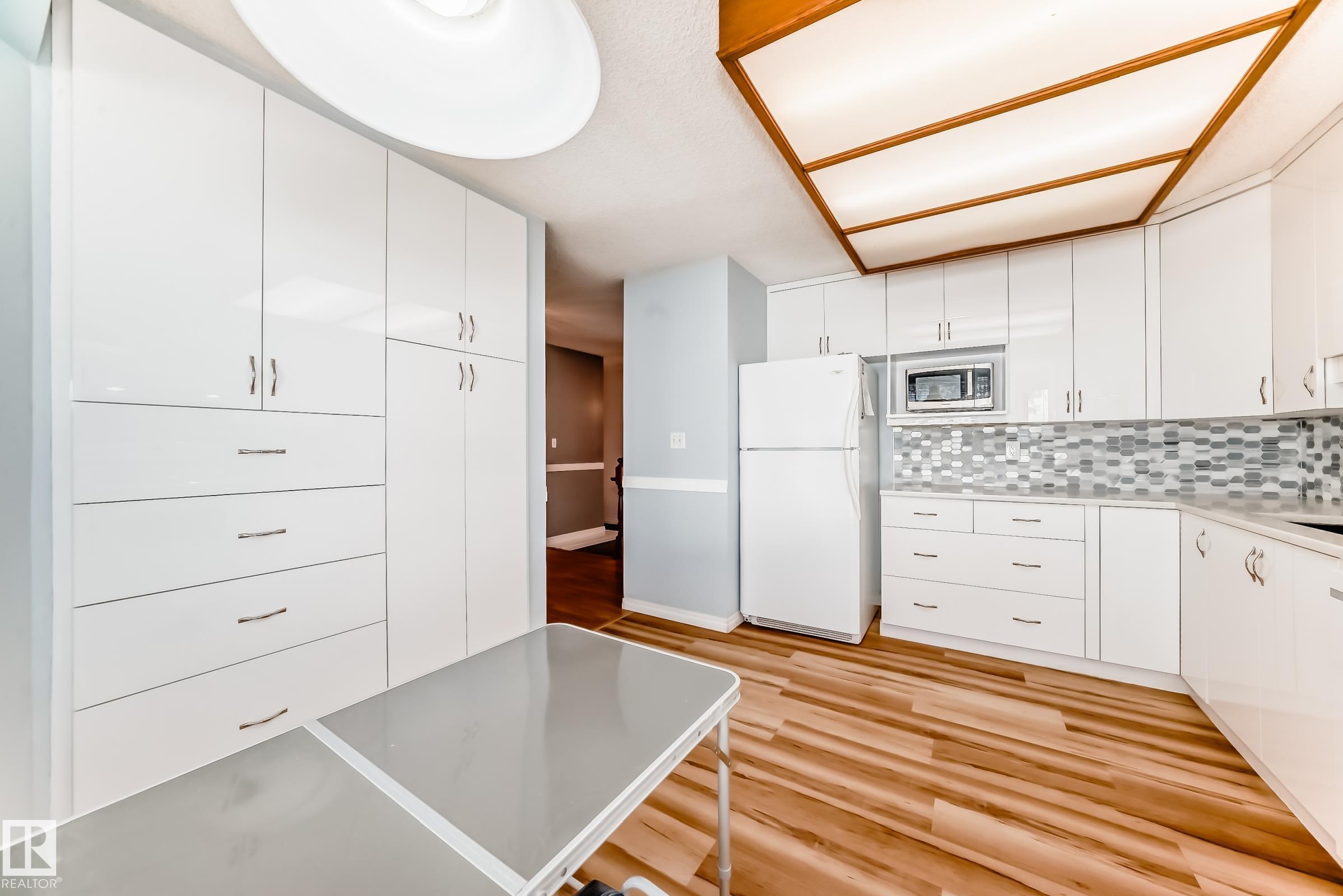Photo 10 at 5927 189 Street NW, Jamieson Place, Edmonton