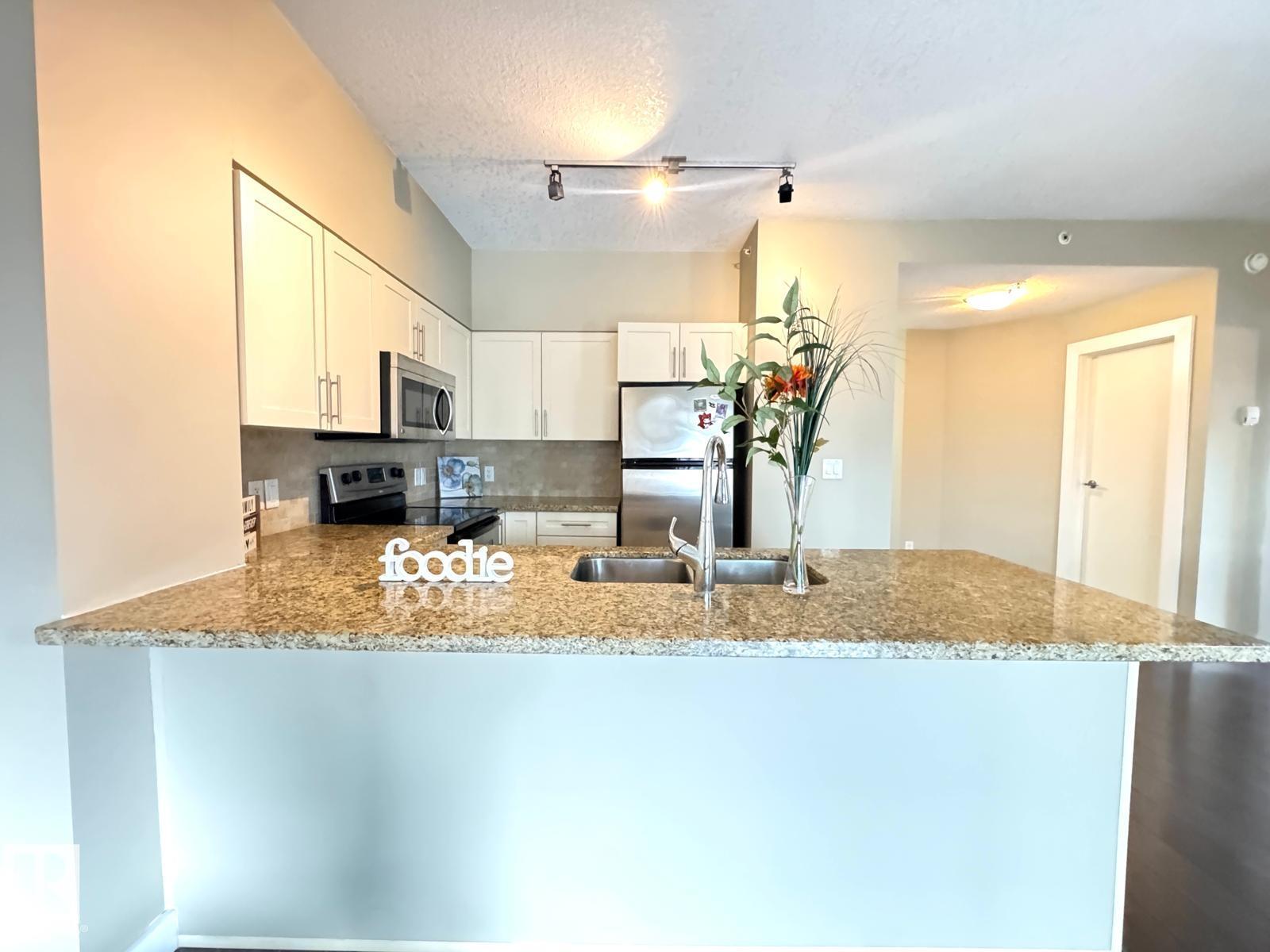 Photo 10 at 702 - 10136 104 Street NW, Downtown, Edmonton