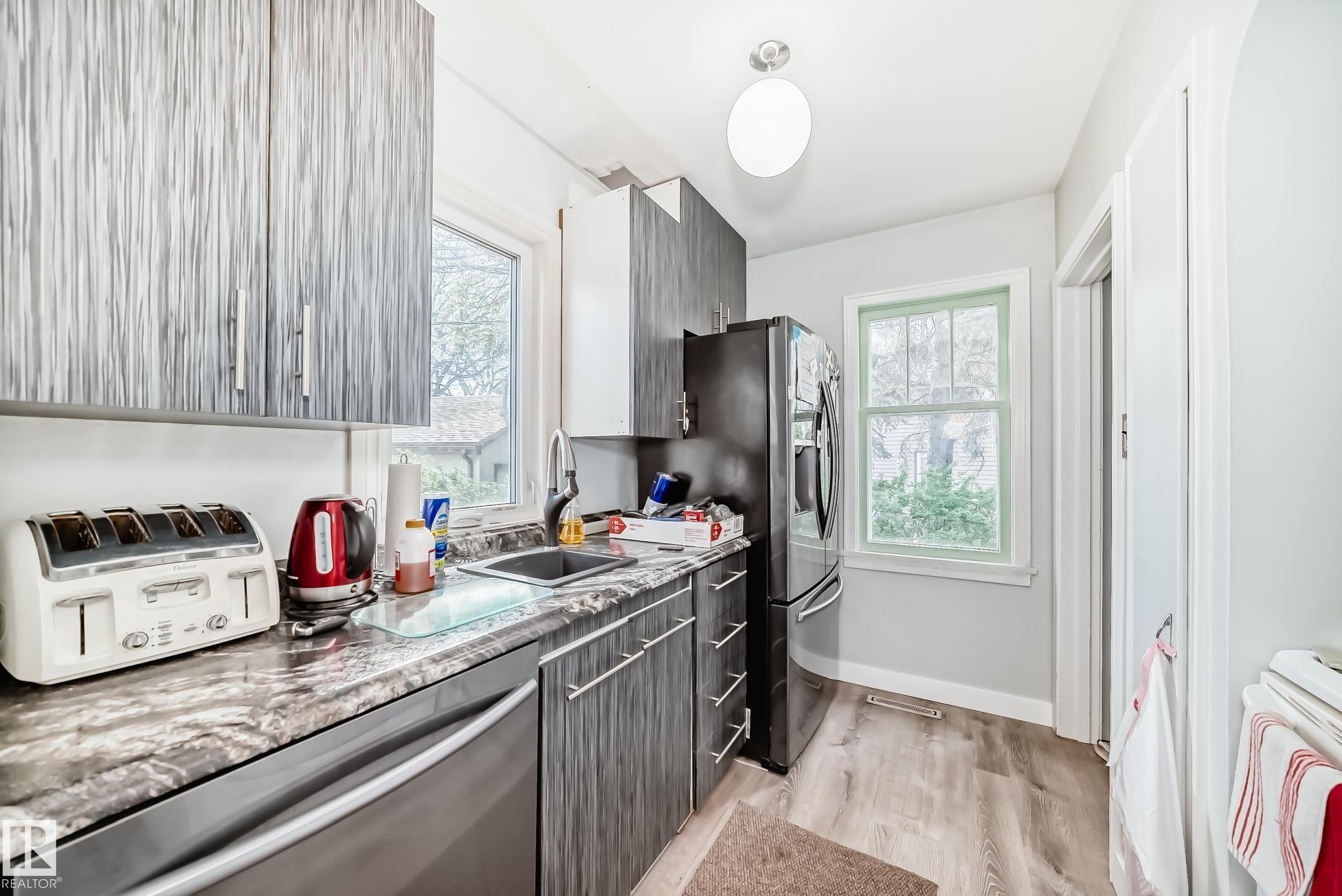 Photo 10 at 11303 60 Street NW, Highlands, Edmonton