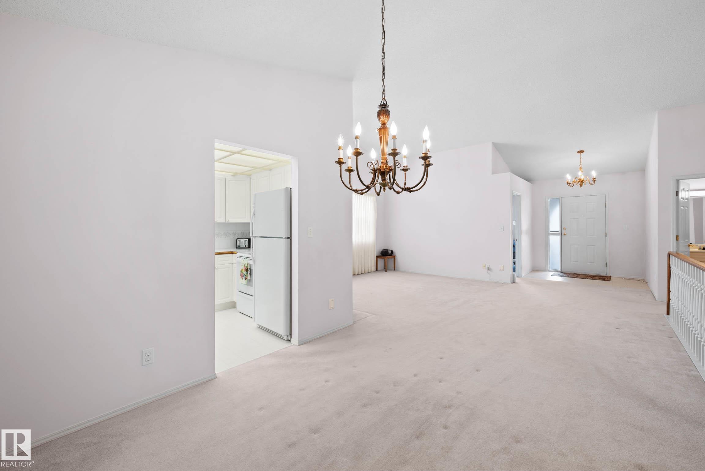 Photo 12 at 12 - 9718 176 Street NW, Terra Losa, Edmonton