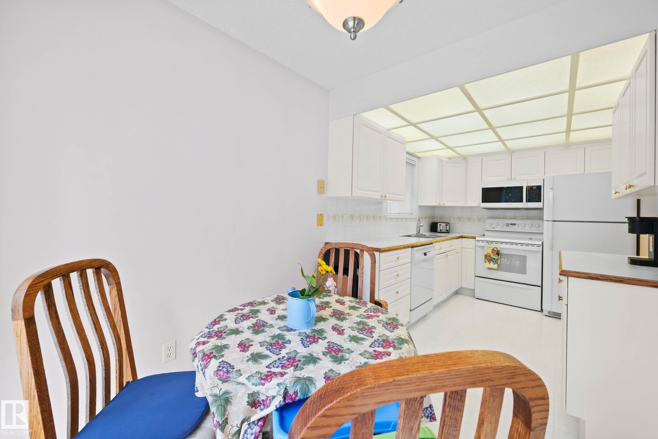 Photo 17 at 12 - 9718 176 Street NW, Terra Losa, Edmonton