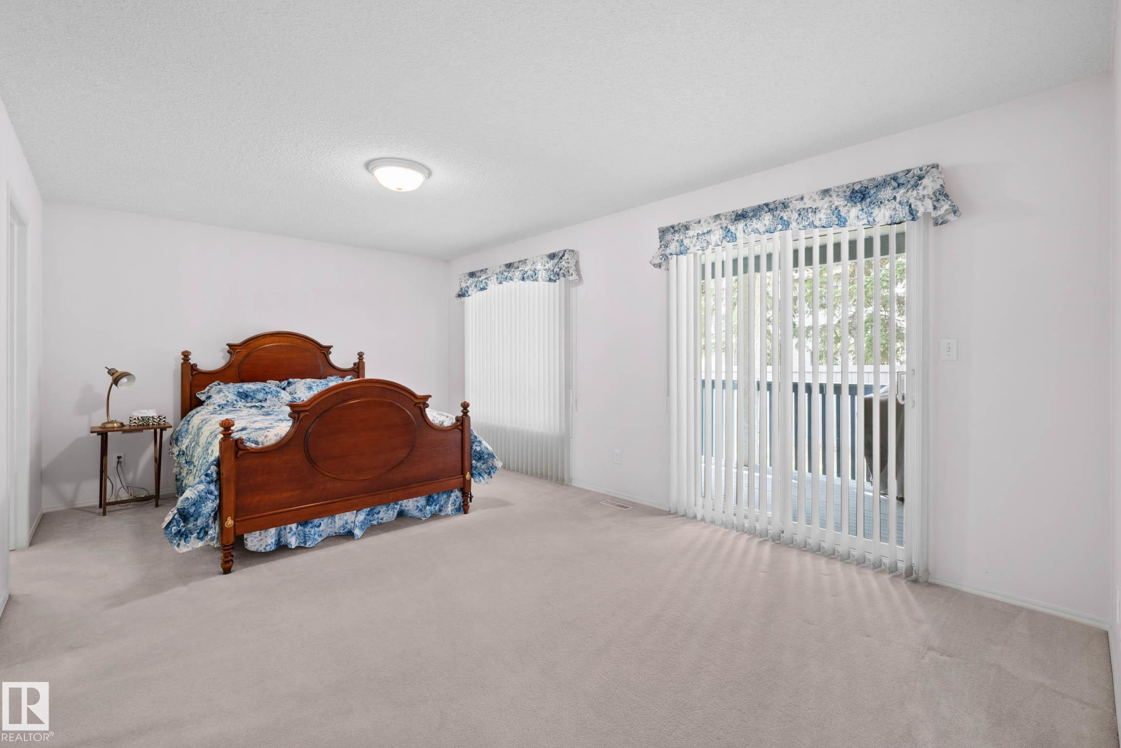 Photo 19 at 12 - 9718 176 Street NW, Terra Losa, Edmonton