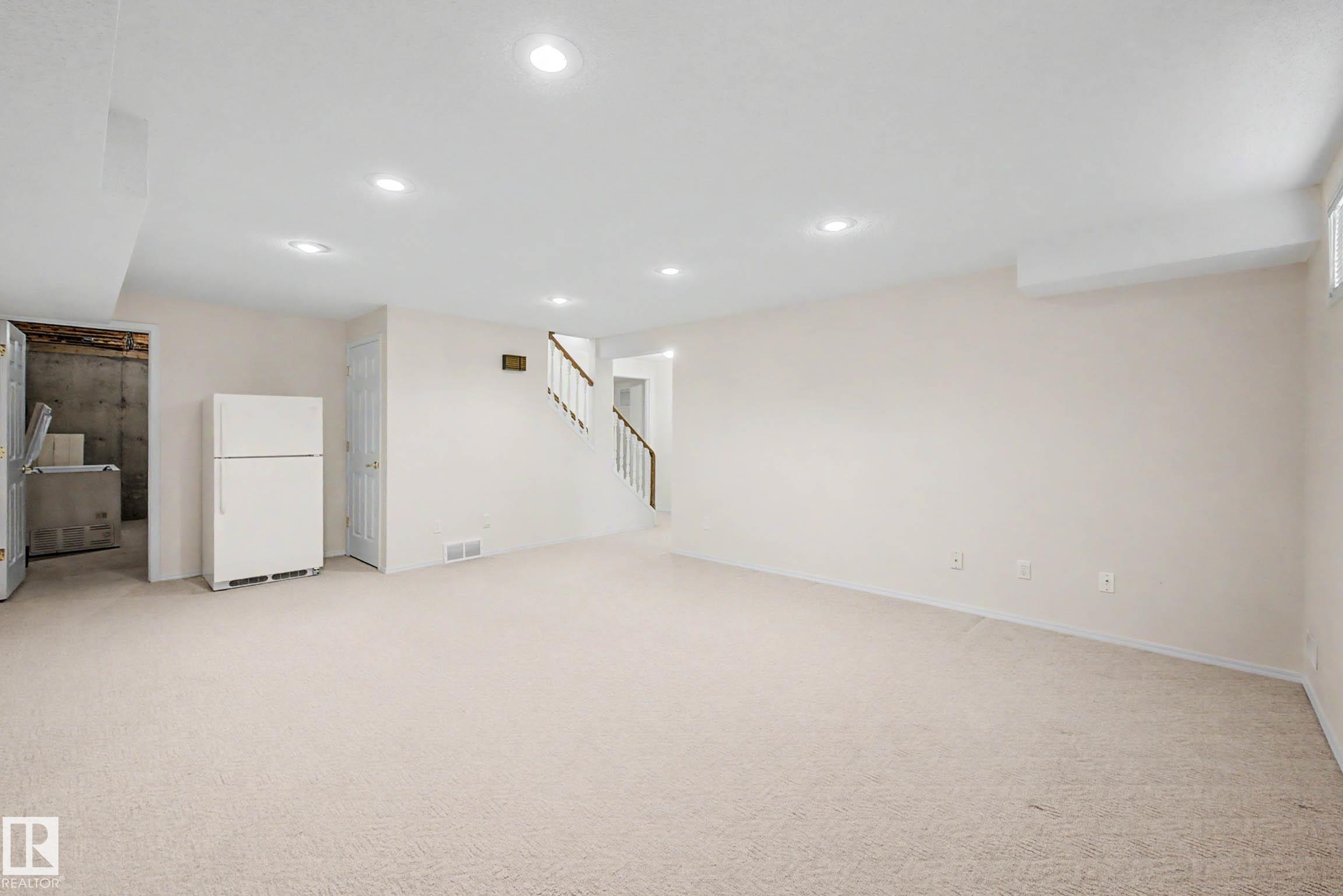 Photo 32 at 12 - 9718 176 Street NW, Terra Losa, Edmonton