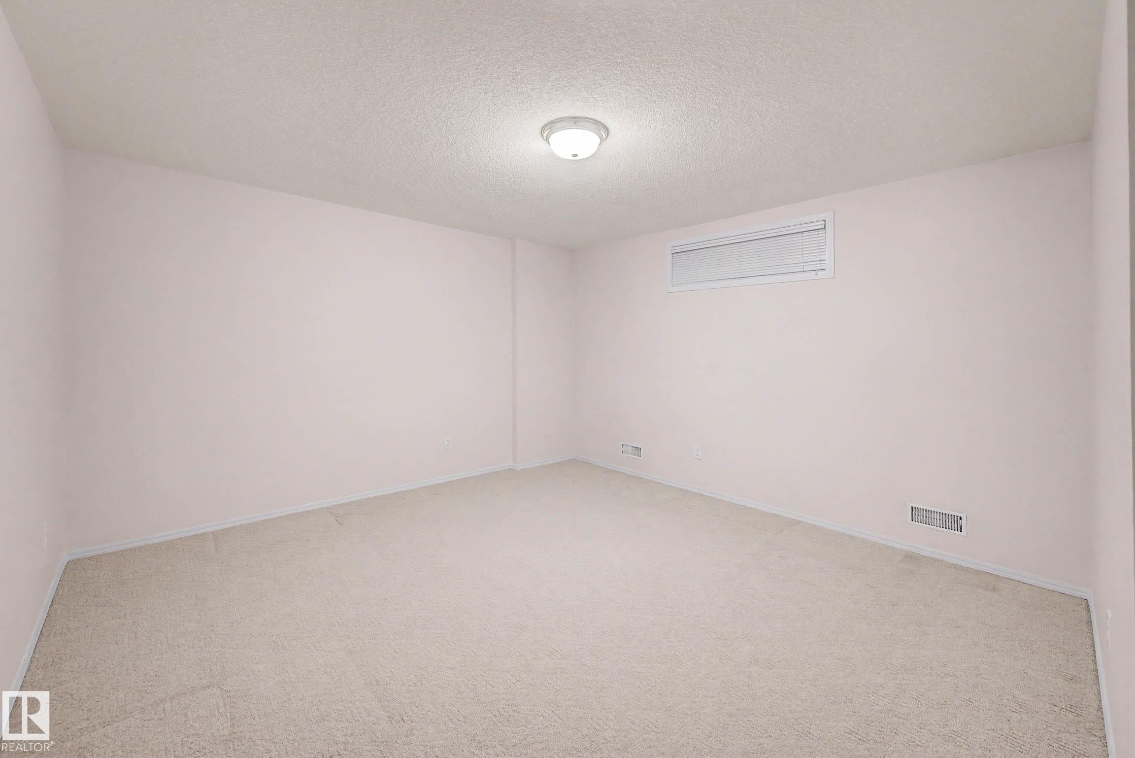 Photo 36 at 12 - 9718 176 Street NW, Terra Losa, Edmonton
