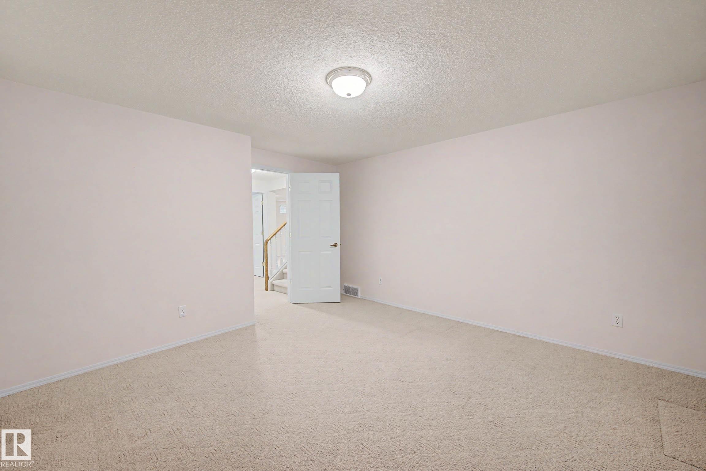 Photo 37 at 12 - 9718 176 Street NW, Terra Losa, Edmonton