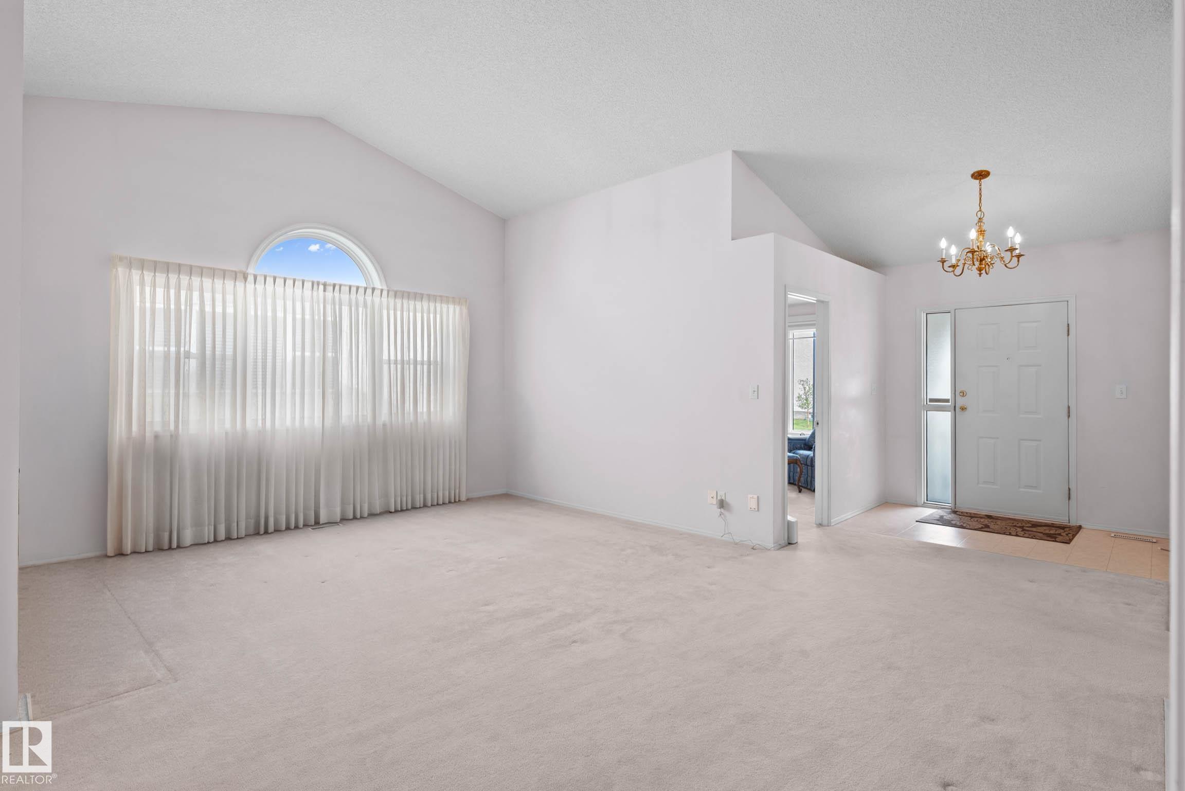 Photo 8 at 12 - 9718 176 Street NW, Terra Losa, Edmonton