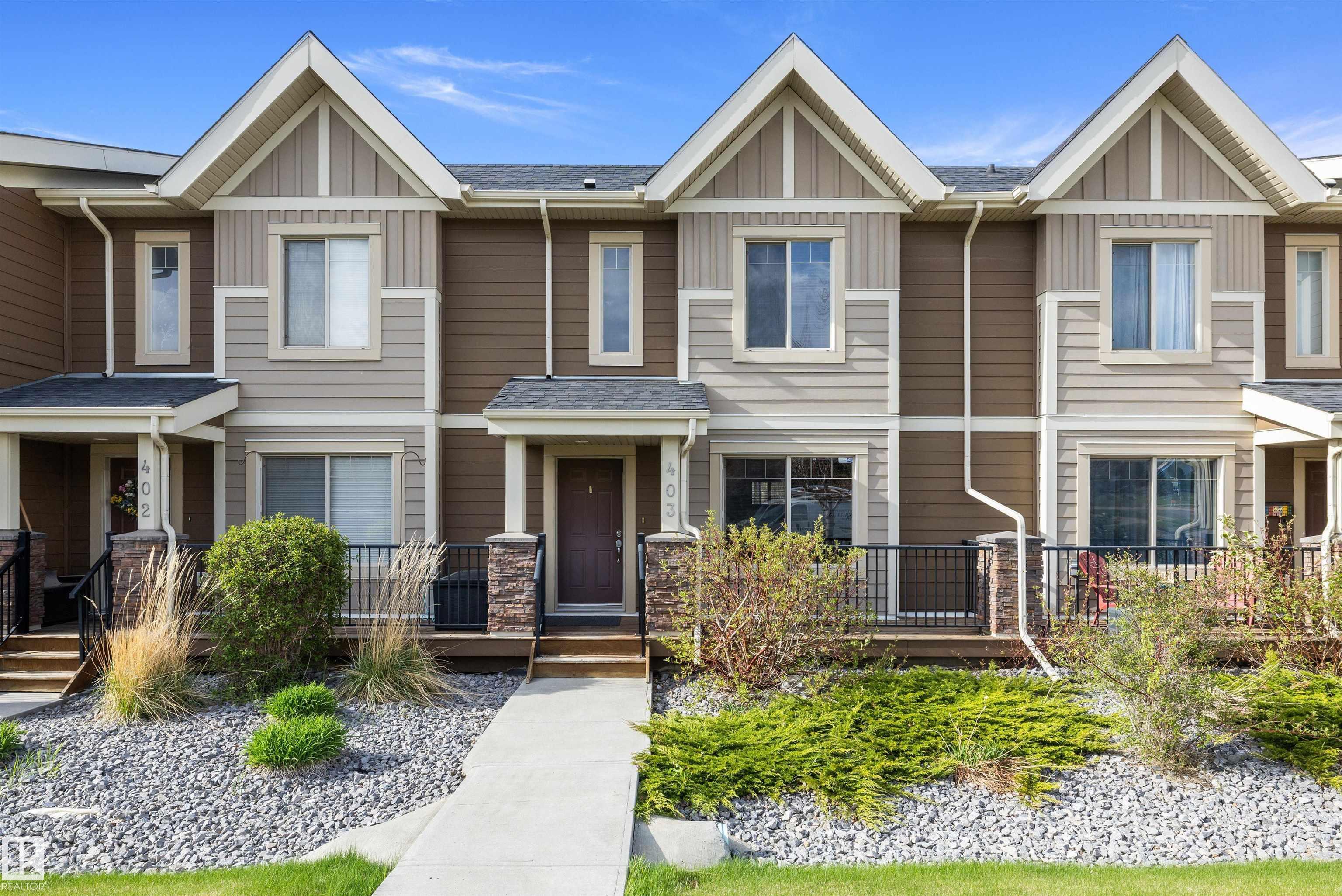 Welcome to Palisades Estates in Centennial Village! This stylish 2-storey townhouse offers over 1,220 sq. ft. of well-designed living space with 2 spacious bedrooms and 2 bathrooms. The bright open-concept main floor features a modern kitchen, generous dining area, and comfortable living room perfect for entertaining. Upstairs, you?ll find a large primary bedroom with ensuite, an additional bedroom, full bathroom, and convenient upper-floor laundry. Enjoy the convenience of a double attached garage, private deck and patio, plus low-maintenance condo living. Ideally located close to parks, shopping, restaurants, schools, and all amenities, with quick access to major commuter routes. A fantastic opportunity for first-time buyers, downsizers, or investors!