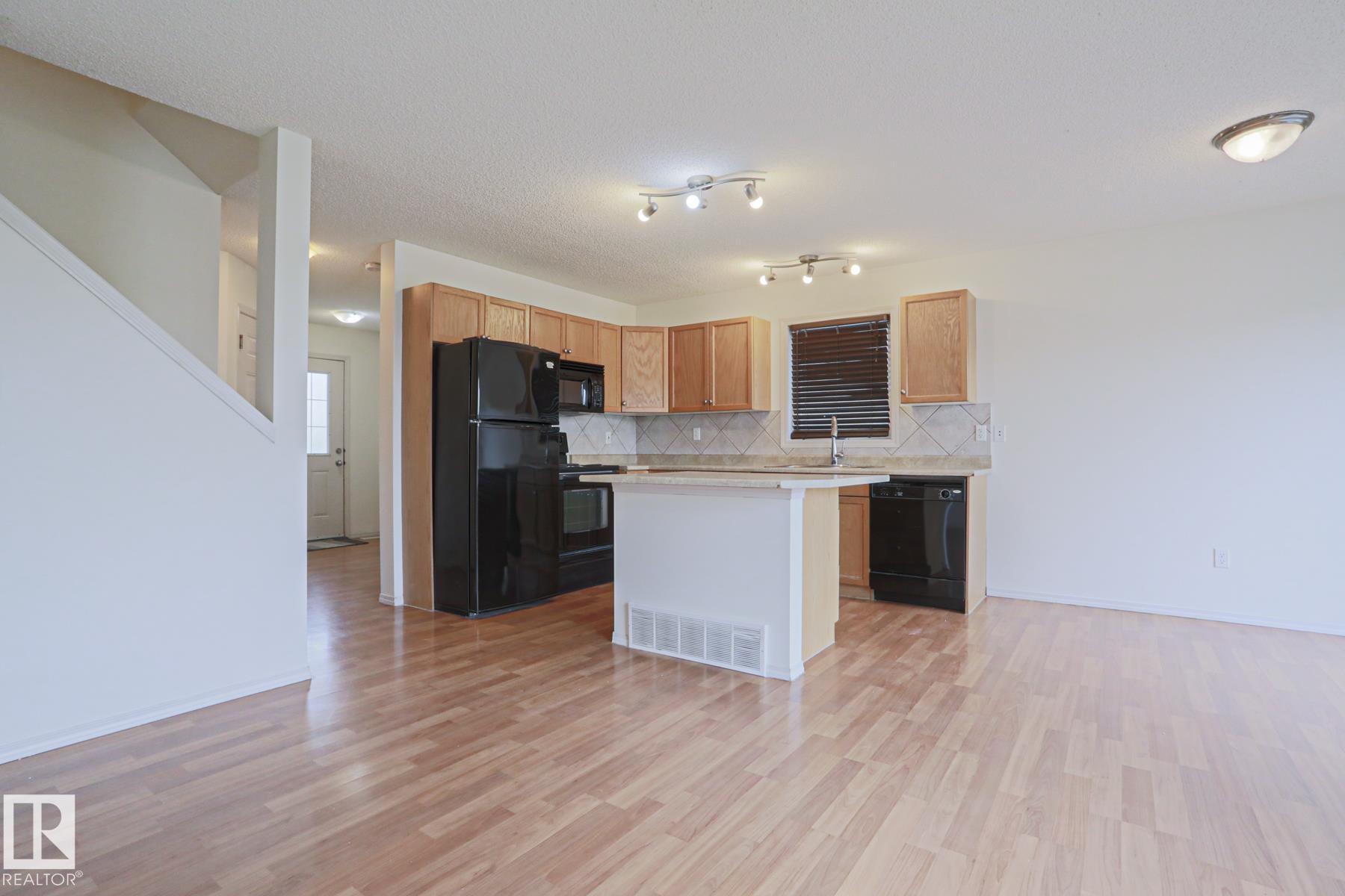 Photo 9 at 1627 Melrose Place SW, Macewan, Edmonton