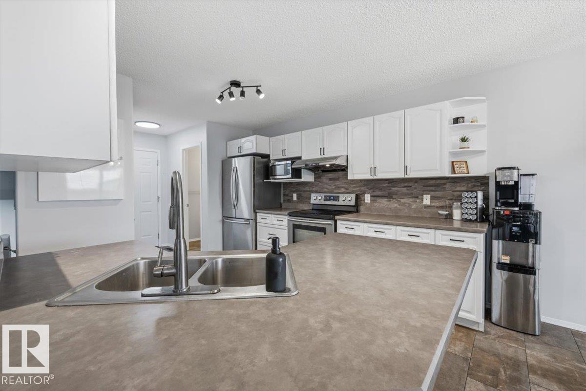 Photo 11 at 3570 Mclean Crescent SW, Macewan, Edmonton