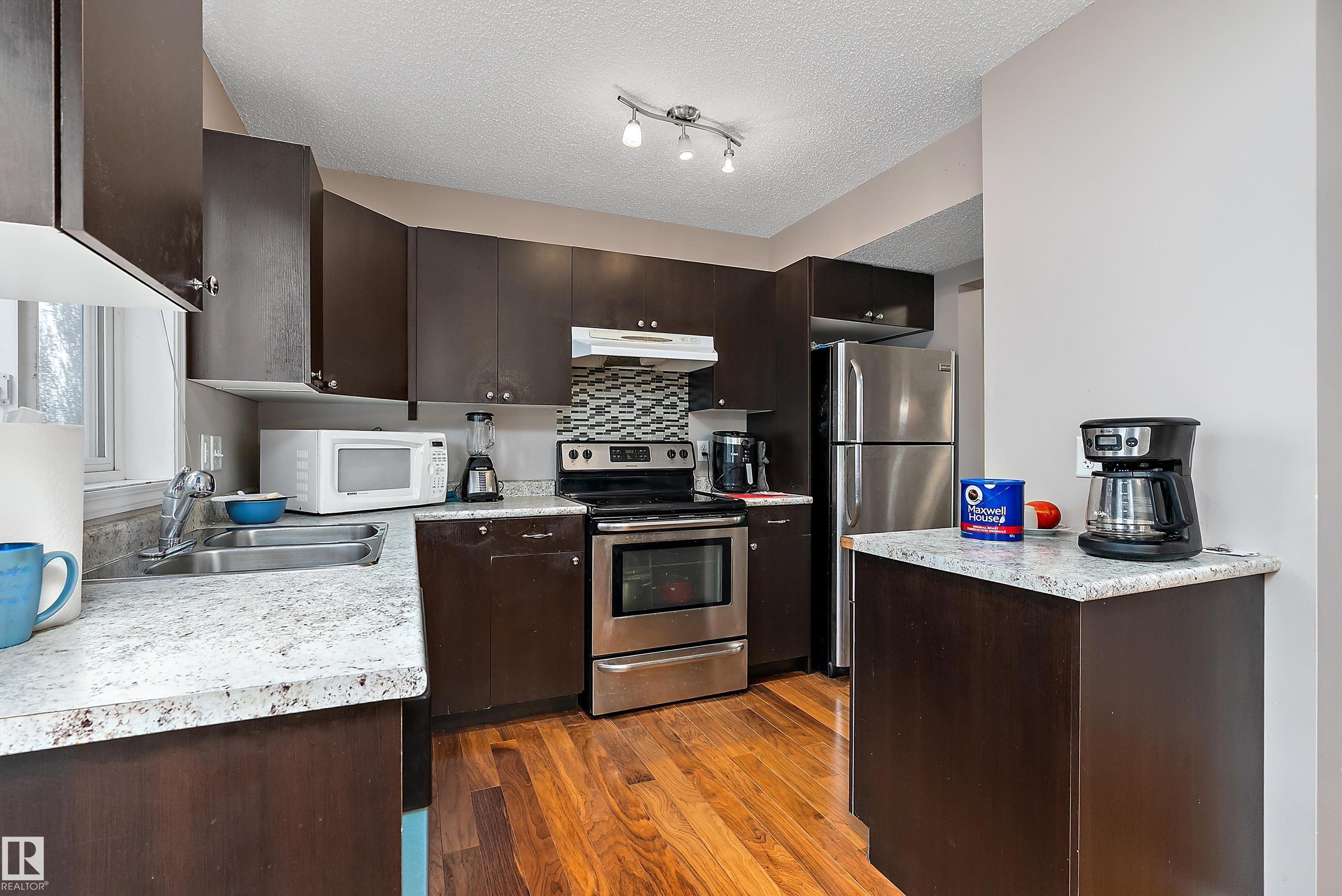 Photo 8 at 120 - 4415 South Park Drive, South Park, Leduc