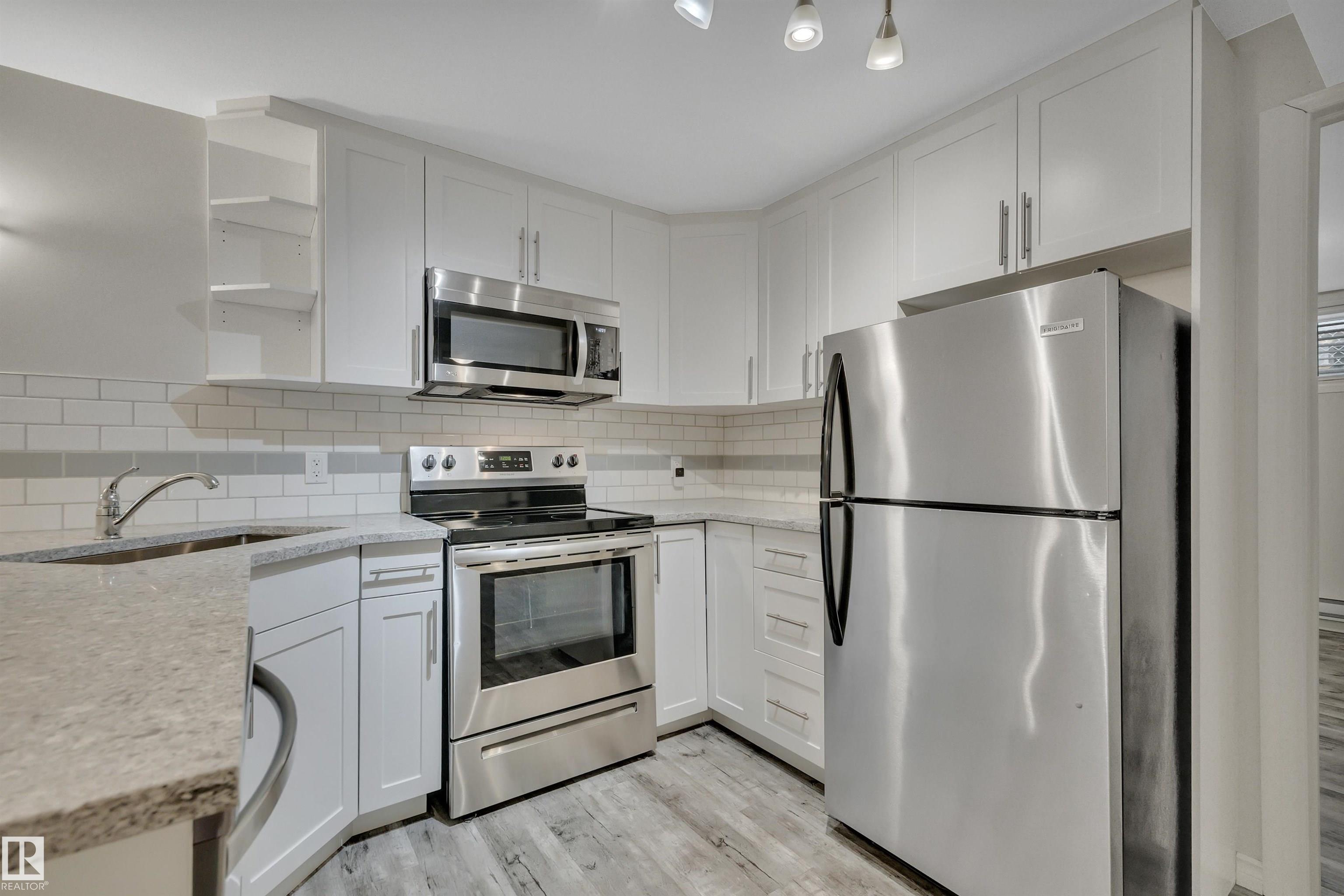 Photo 35 at 13432 58 Street NW, Belvedere, Edmonton