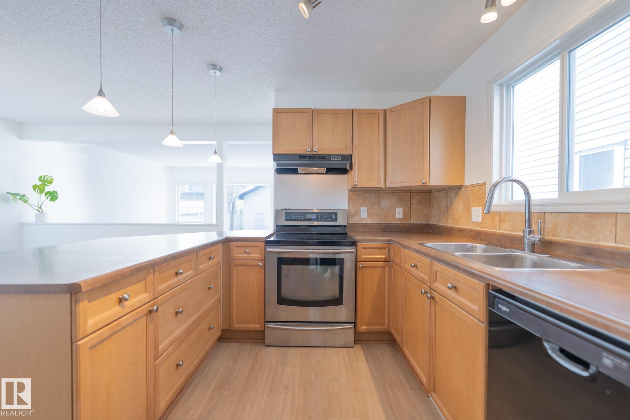 Photo 11 at 20339 58 Avenue NW, The Hamptons, Edmonton