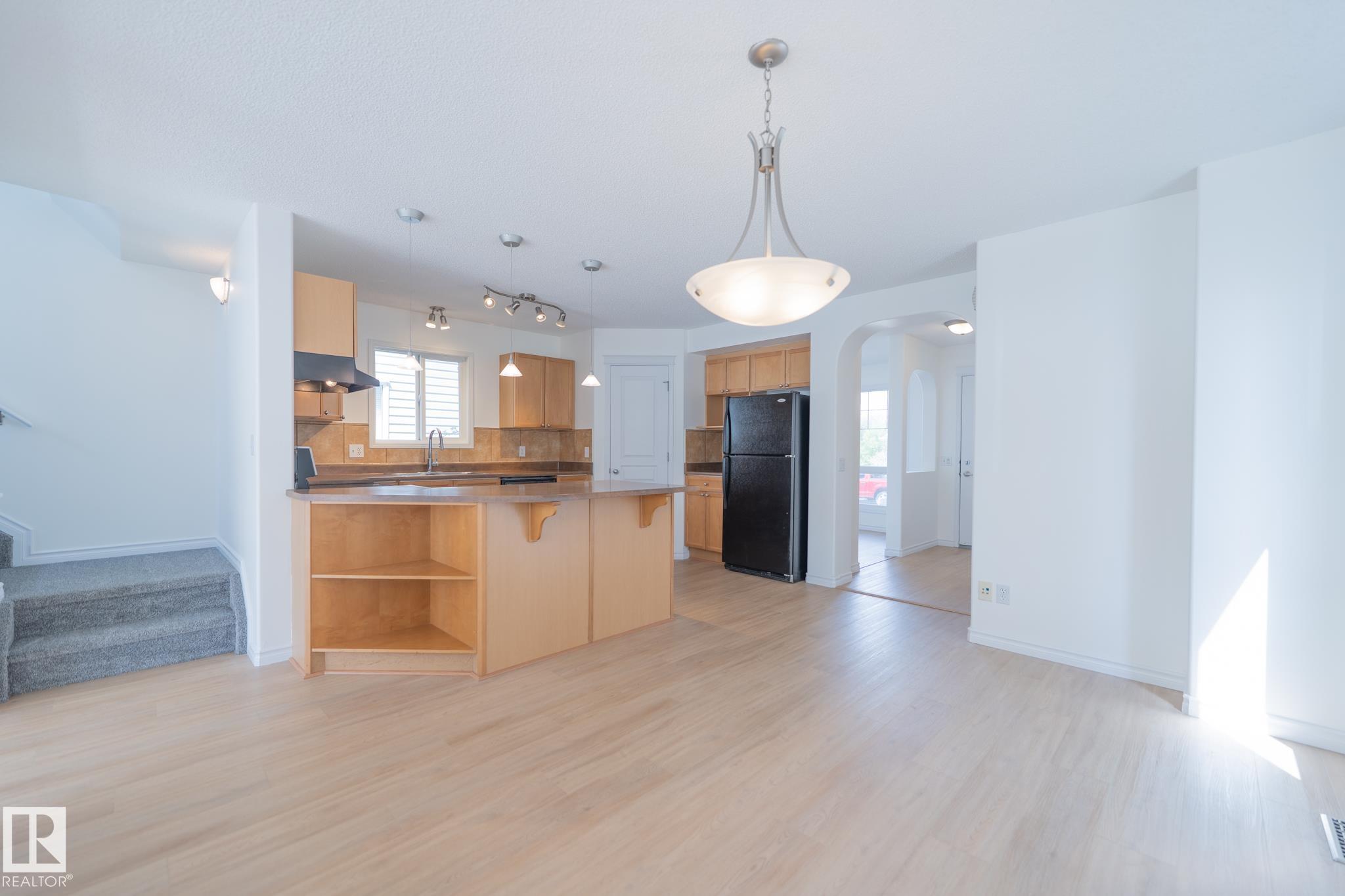 Photo 13 at 20339 58 Avenue NW, The Hamptons, Edmonton