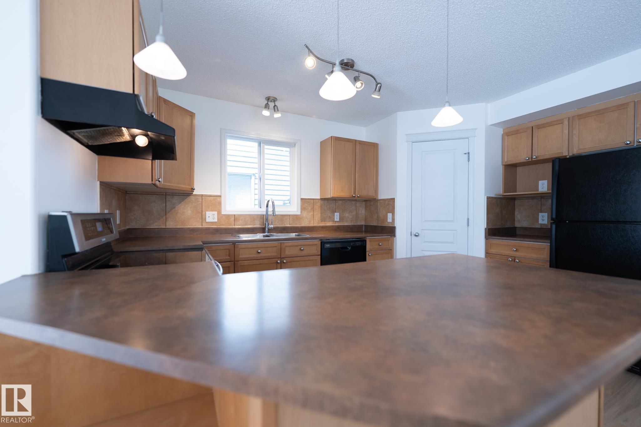 Photo 14 at 20339 58 Avenue NW, The Hamptons, Edmonton