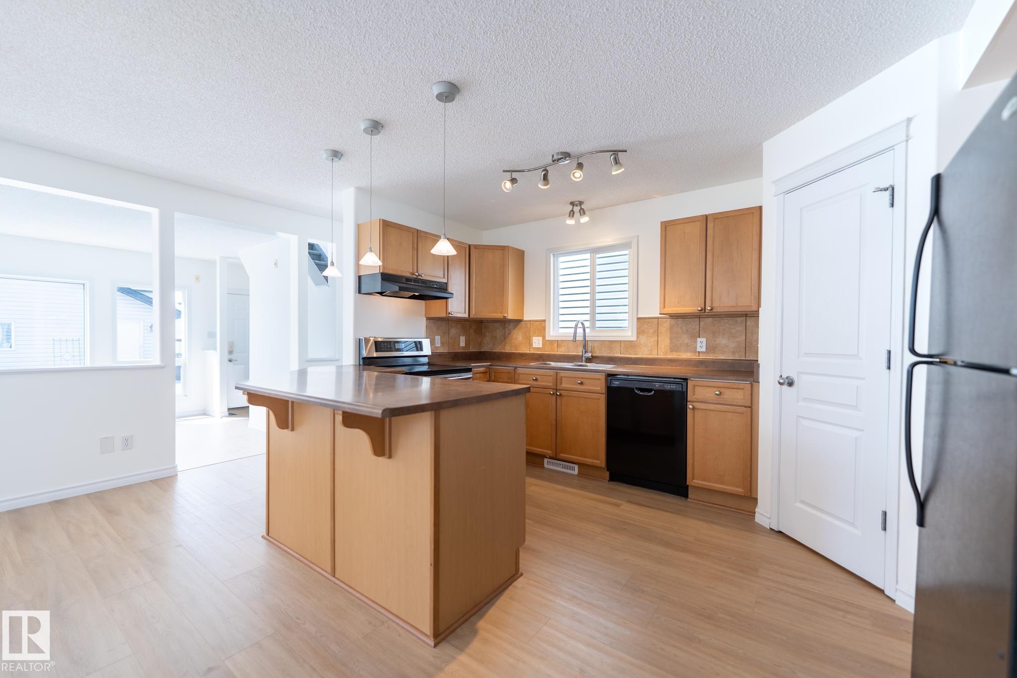 Photo 9 at 20339 58 Avenue NW, The Hamptons, Edmonton
