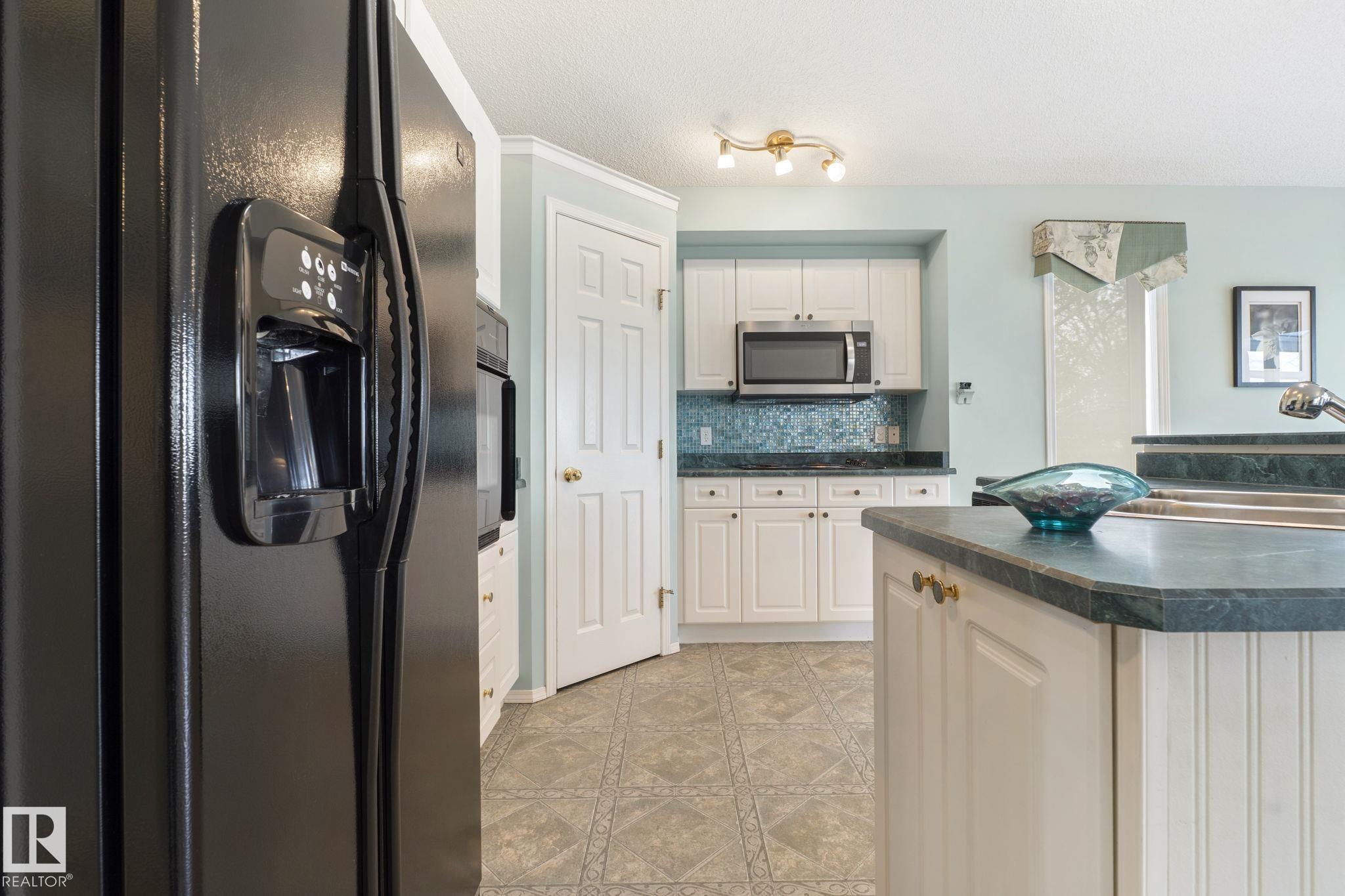 Photo 7 at 9315 162 Avenue NW, Eaux Claires, Edmonton