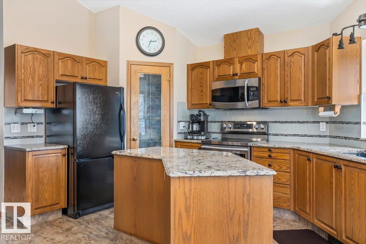 Photo 19 at 5611 152b Avenue NW, Casselman, Edmonton