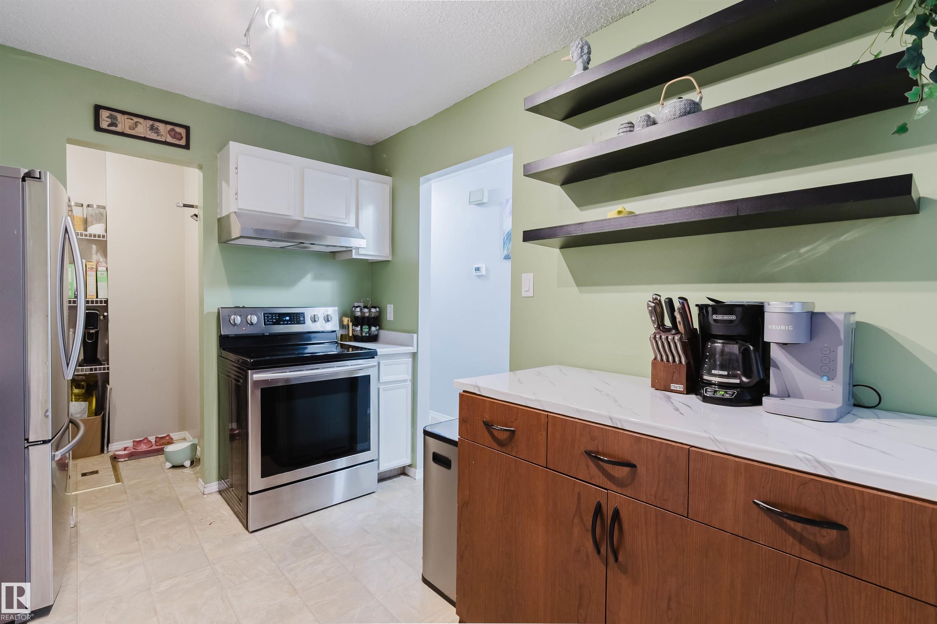 Photo 11 at 15017 26 Street NW, Fraser, Edmonton