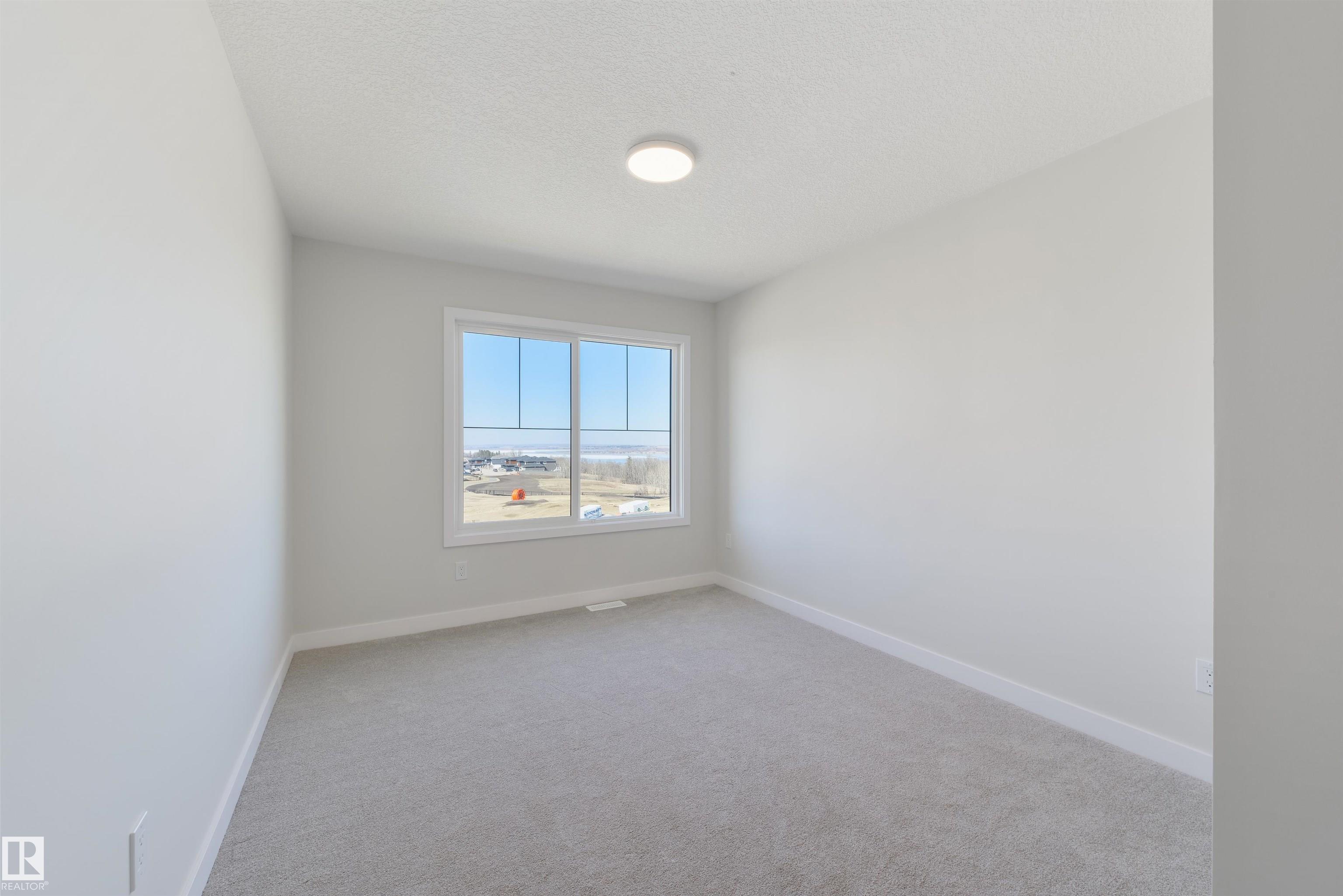 Photo 30 at 1443 Osprey crest NW, Hawks Ridge, Edmonton