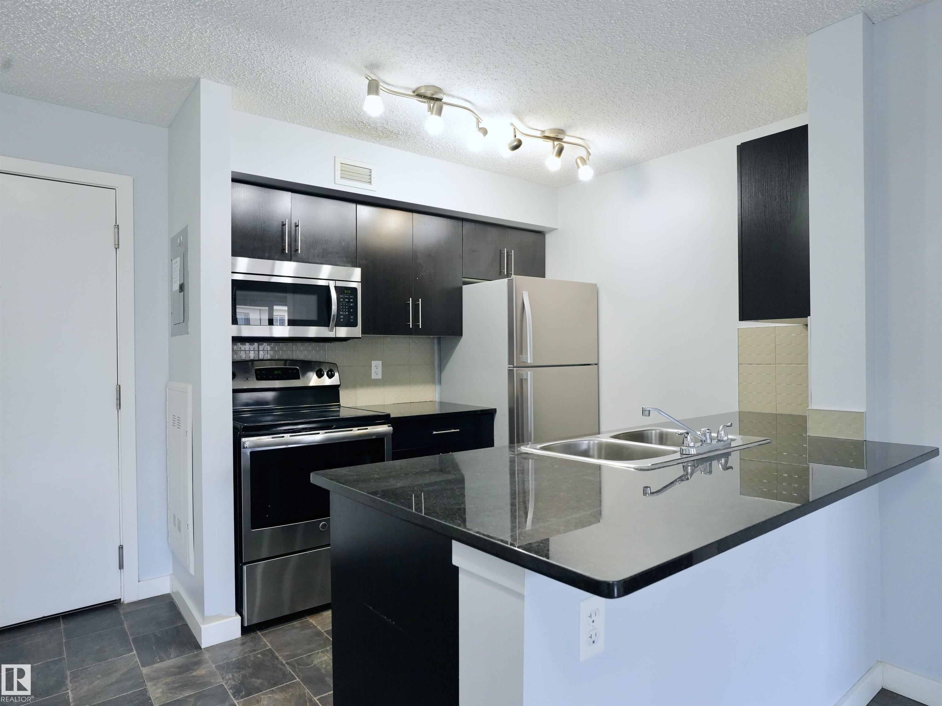 Photo 8 at 320 - 5816 Mullen Place NW, MacTaggart, Edmonton