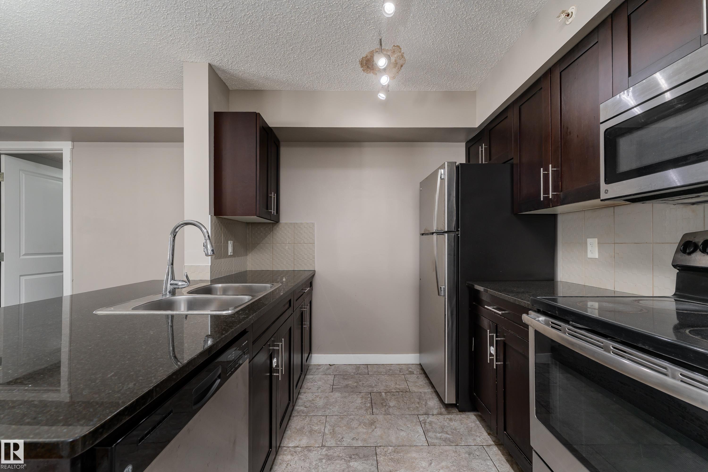 Photo 13 at 409 - 5804 Mullen Place NW, MacTaggart, Edmonton