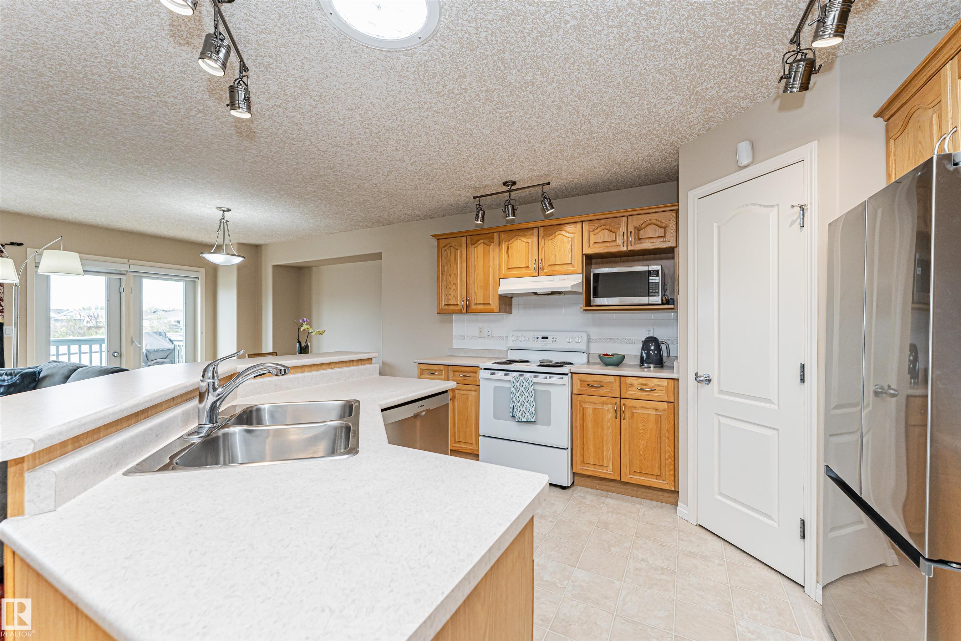 Photo 17 at 15 - 16415 77 Street NW, Mayliewan, Edmonton