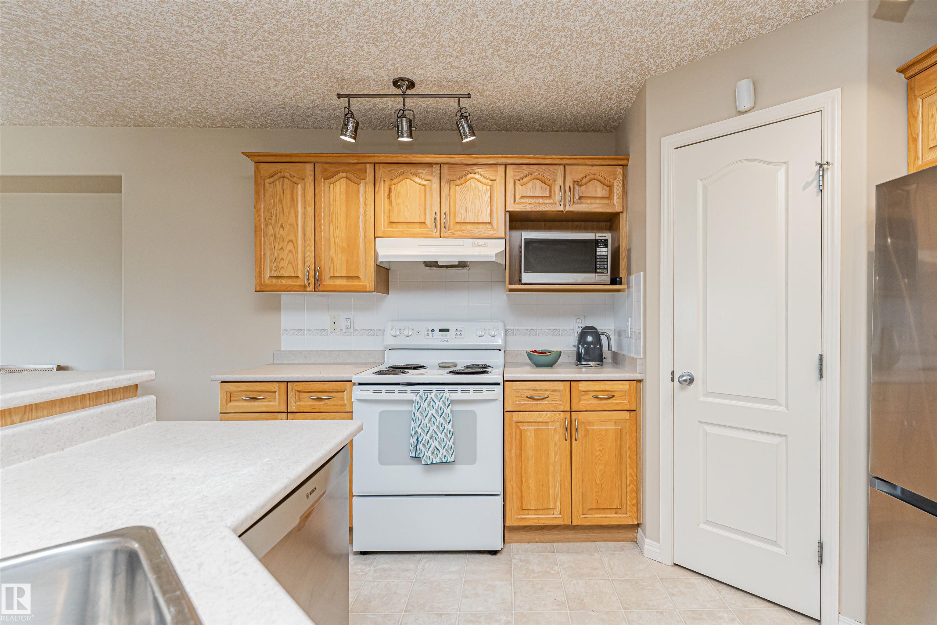 Photo 18 at 15 - 16415 77 Street NW, Mayliewan, Edmonton